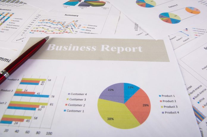 Business report. Graphs and charts. Business reports and pile of documents. Business concept.