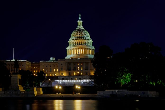 Panoramic of the Capital of the United States with the capital pool in light United States landmark.