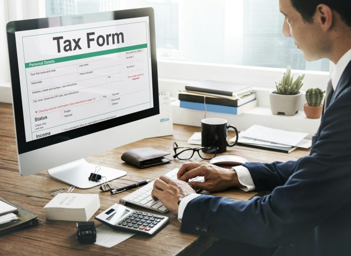 Tax Credits Claim Return Deduction Refund Concept