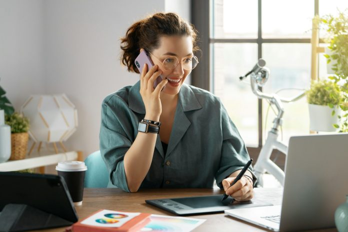 Woman is working at workshop