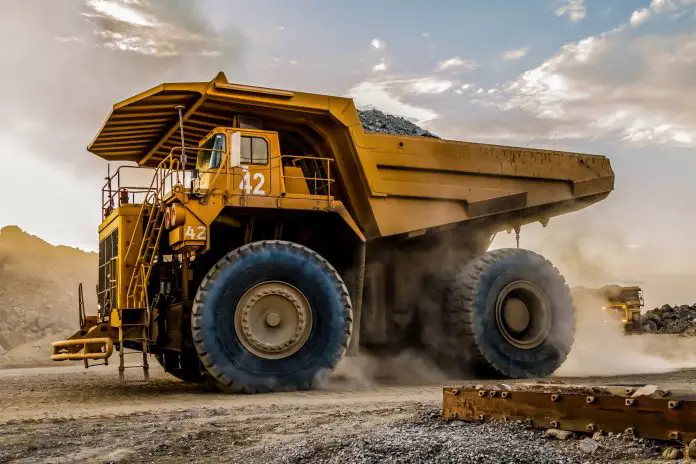 Dump Truck transporting Platinum ore for processing