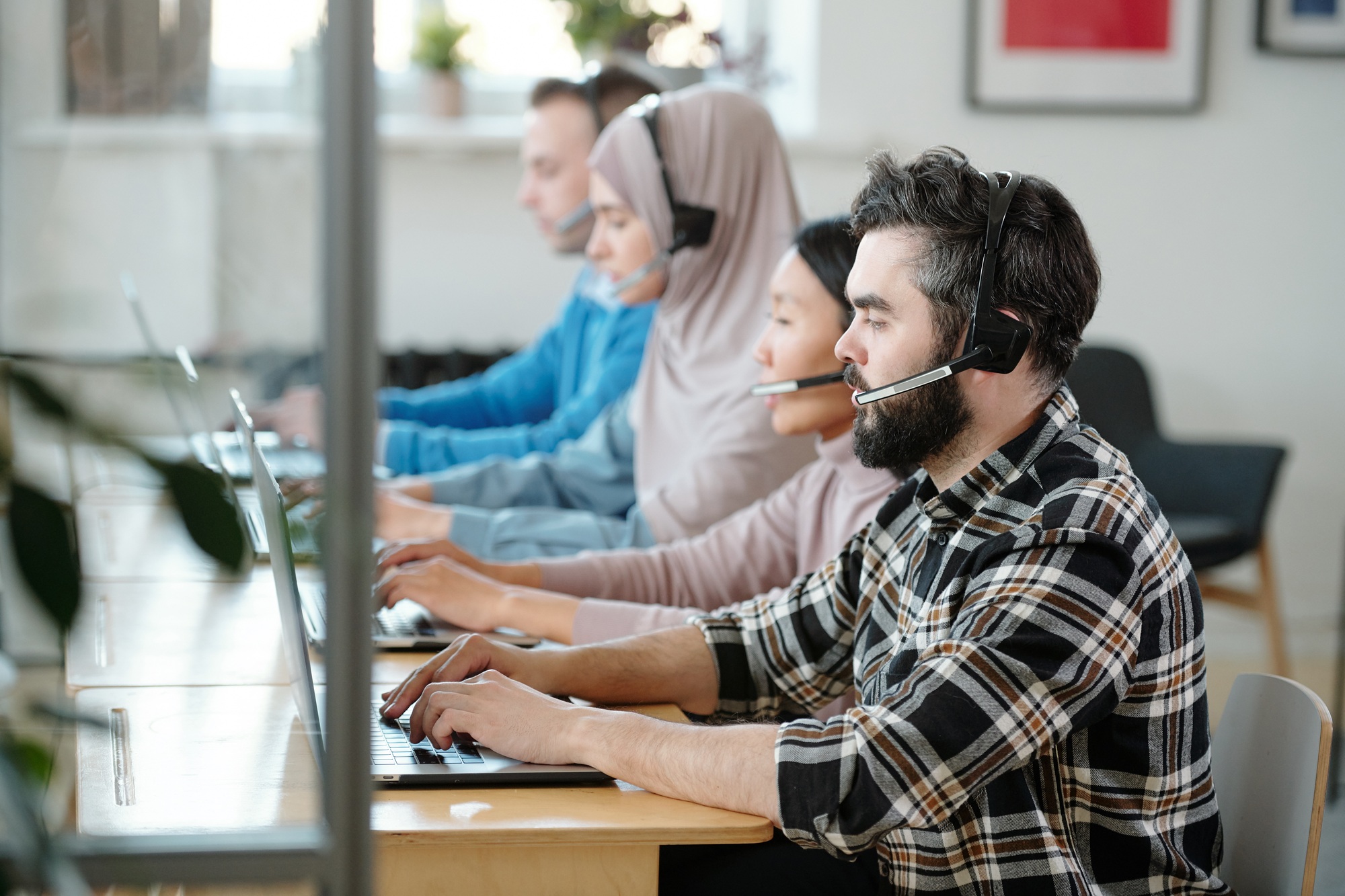 Row of call center operators at work