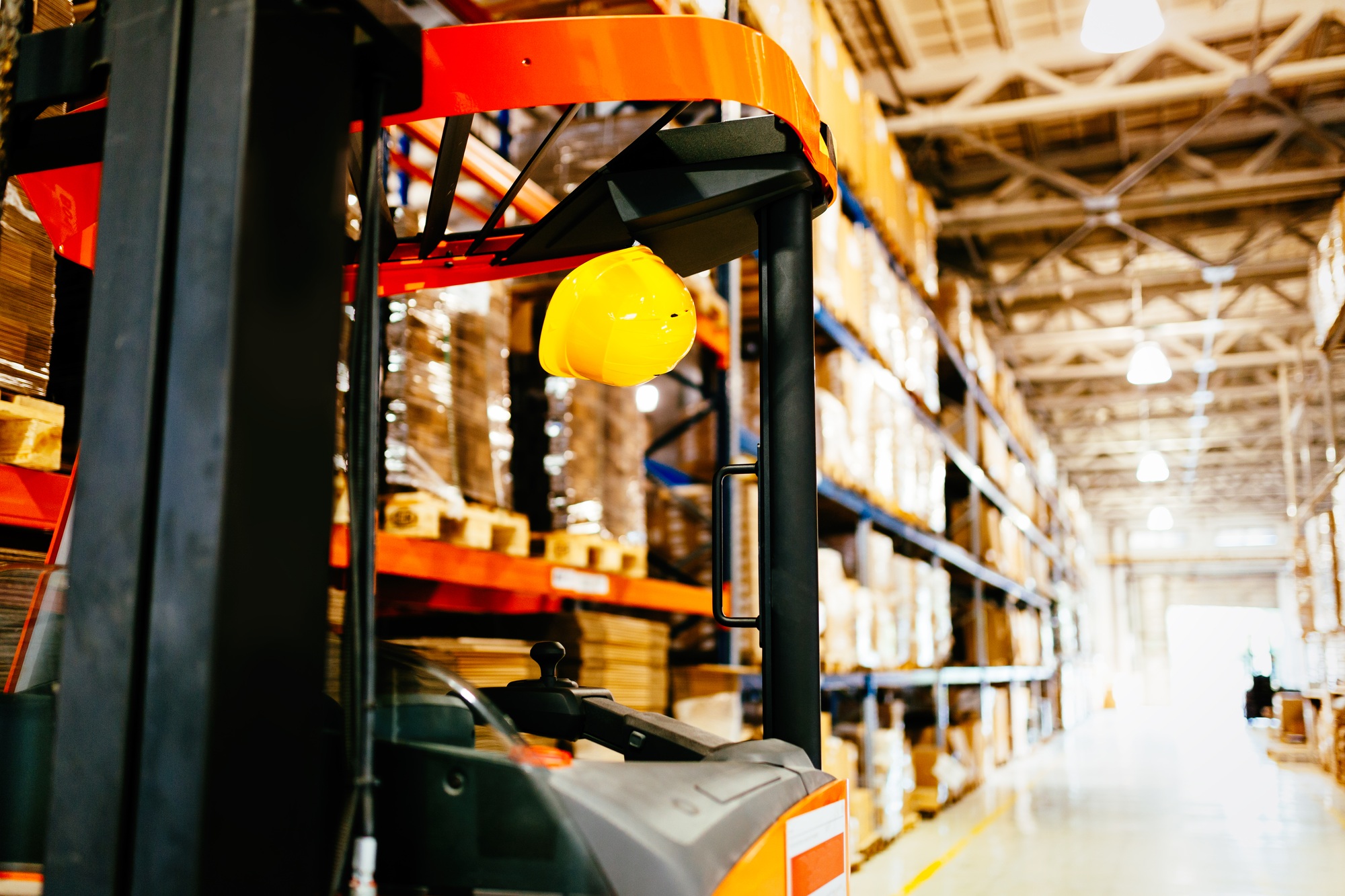 Picture of forklift machine parked in warehouse