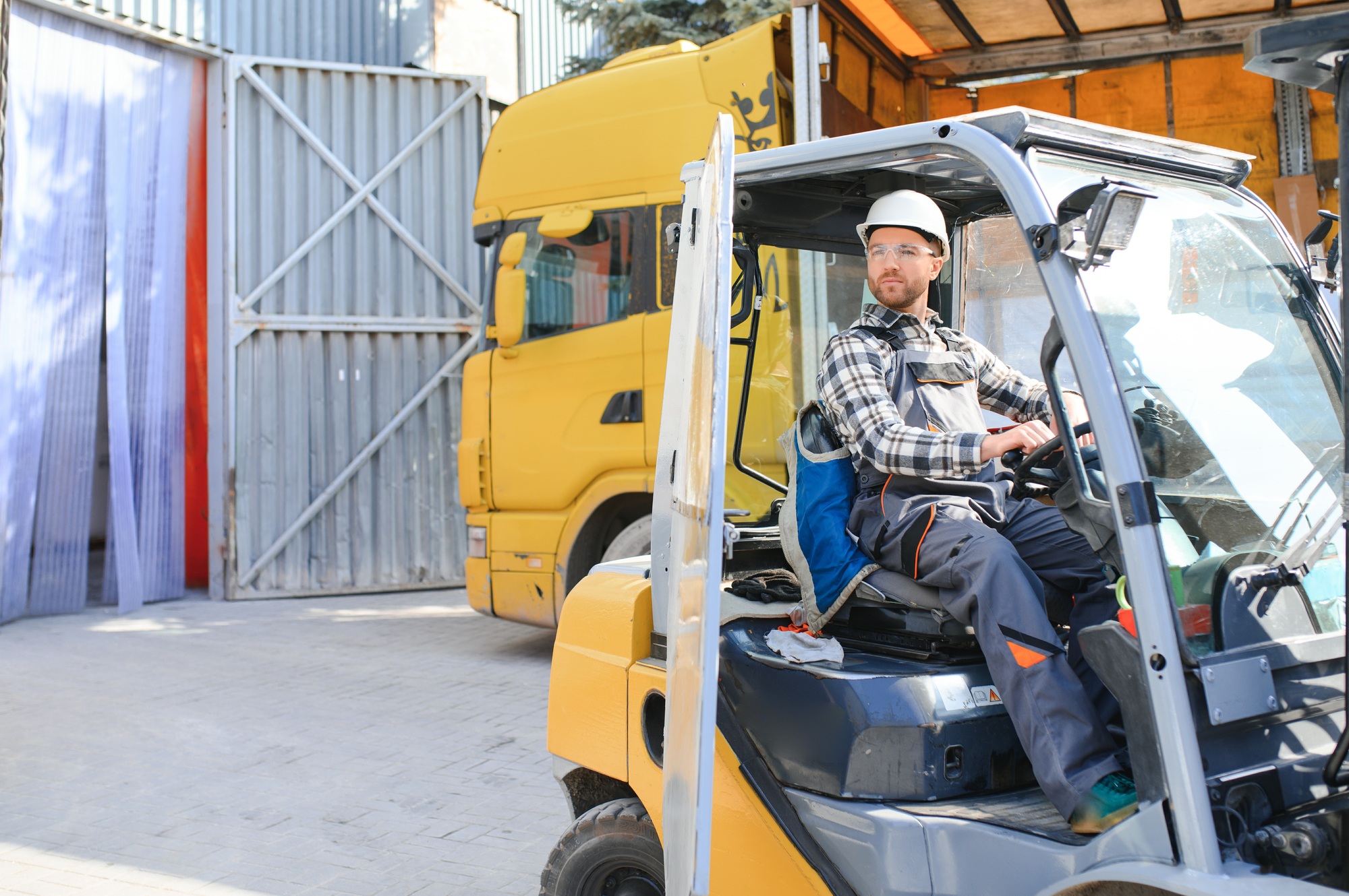 Warehouse man worker with forklift