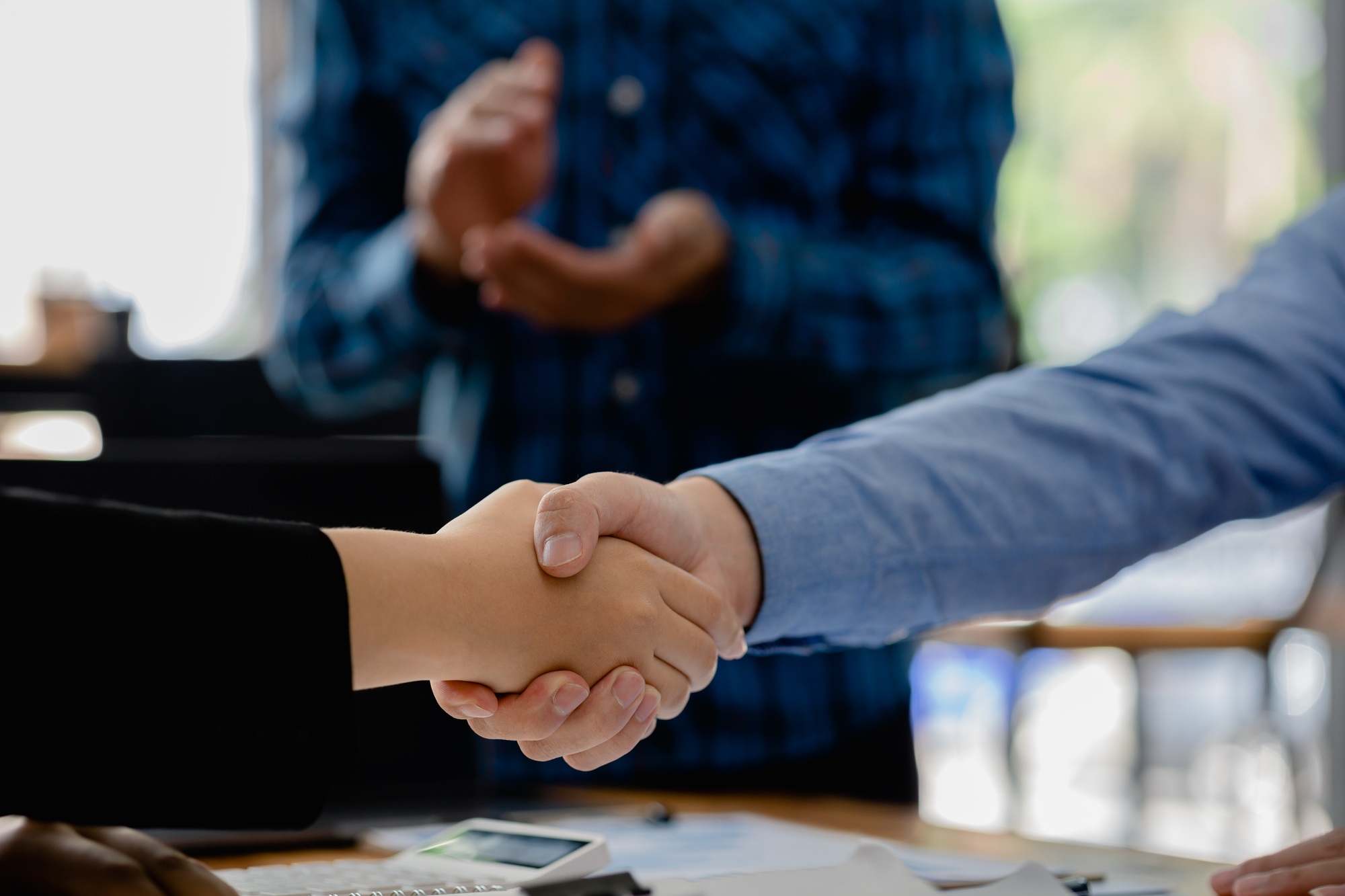 Business dealings and handshakes, startup company marketing team meetings.