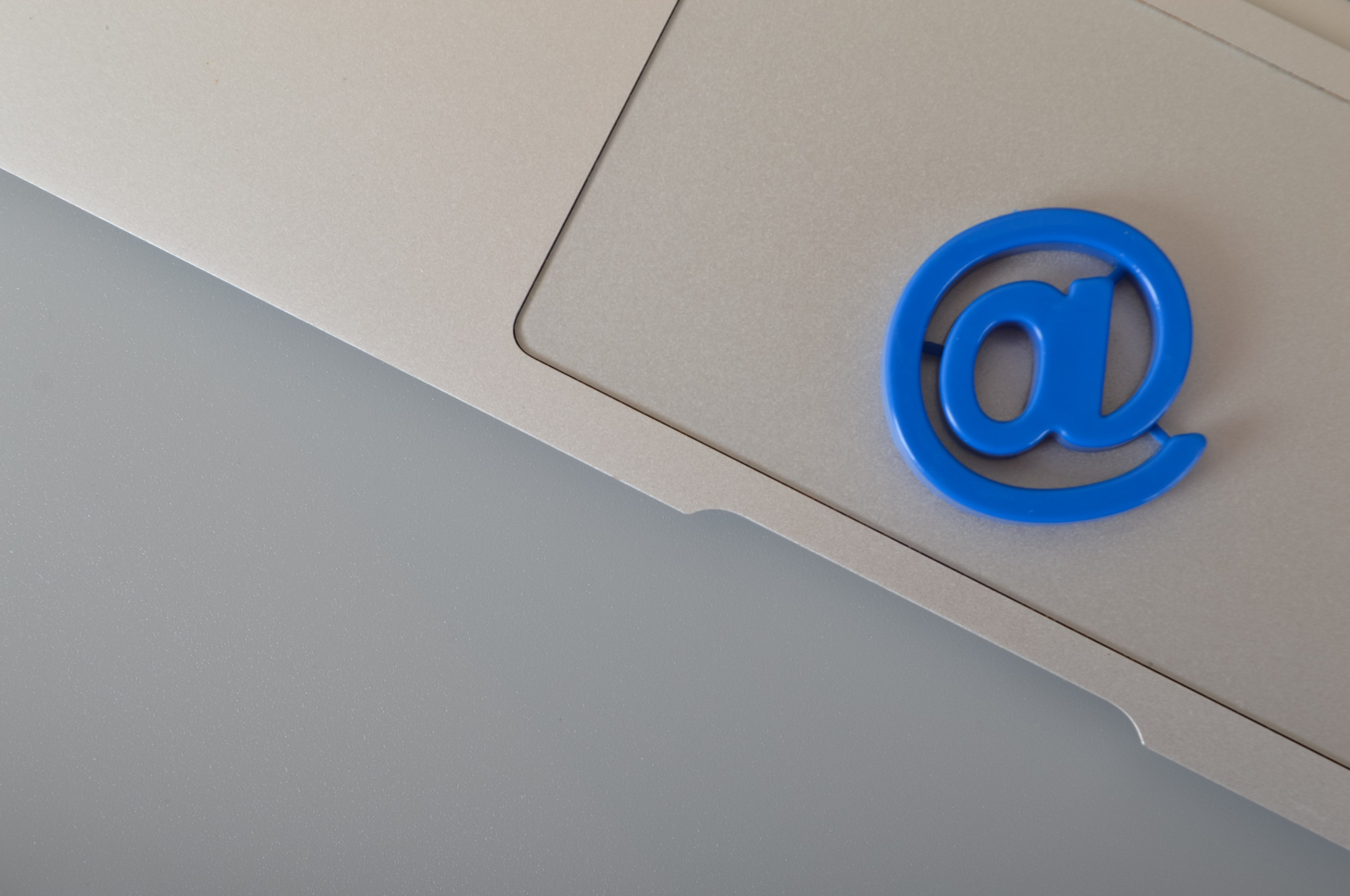 Grey laptop and email marketing symbol. Email marketing and internet email communication concept