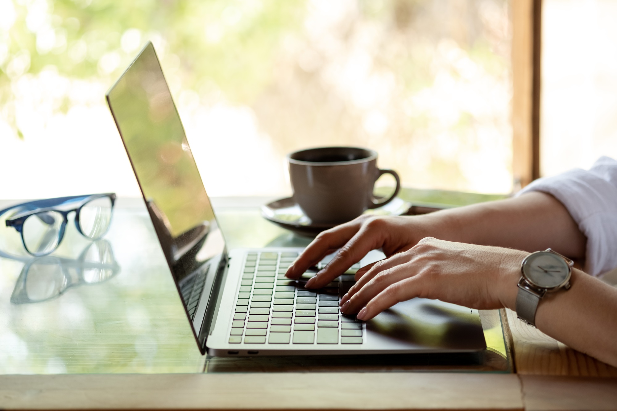 line,Close up image of woman hands typing on laptop computer keyboard and surfing the internet on