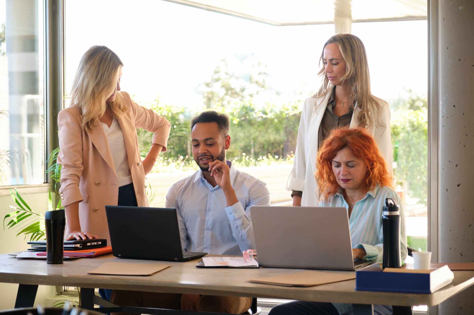 Multiracial business people discussing for project proposal or marketing.