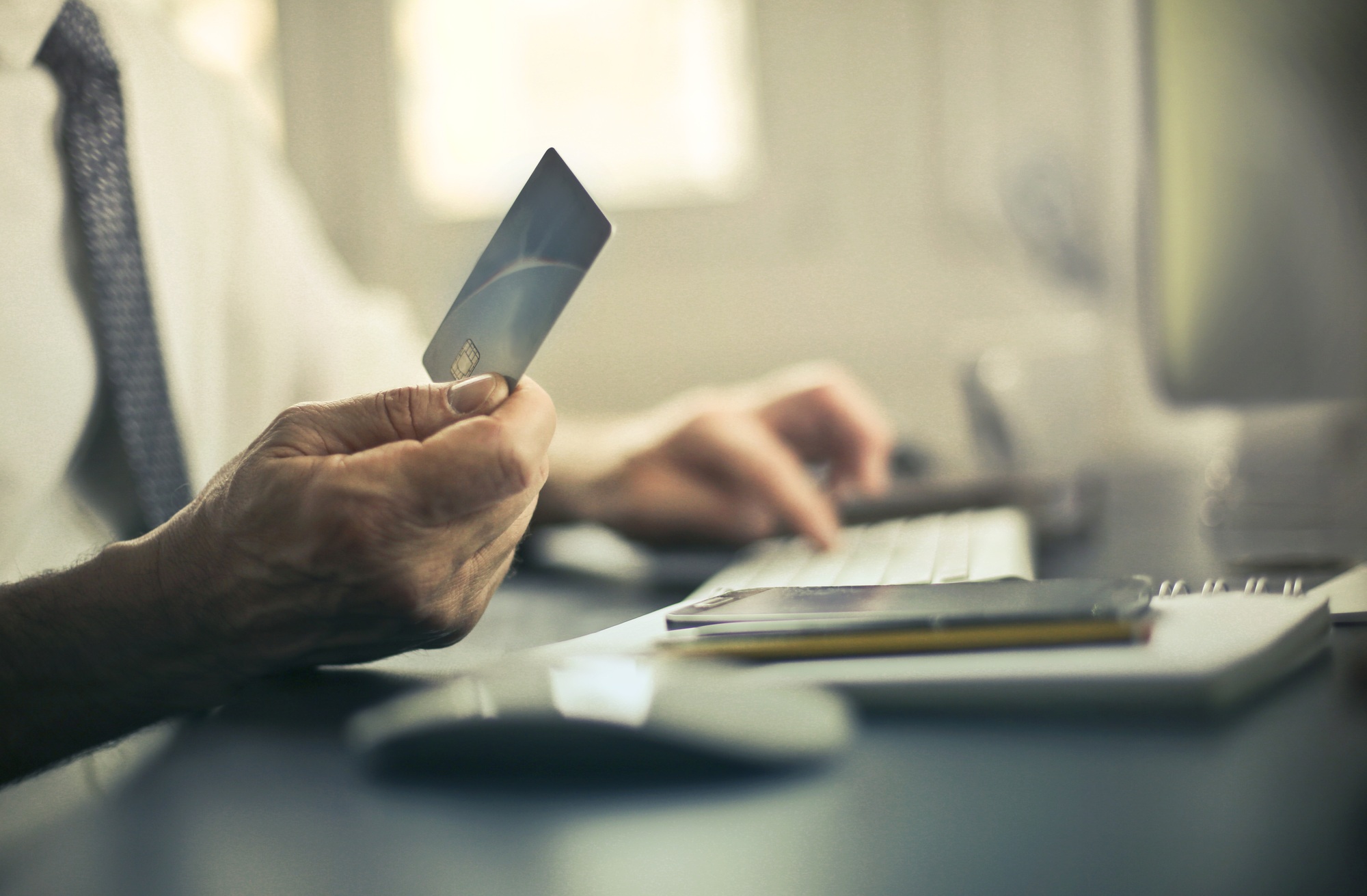 Shot of a male holding a business card