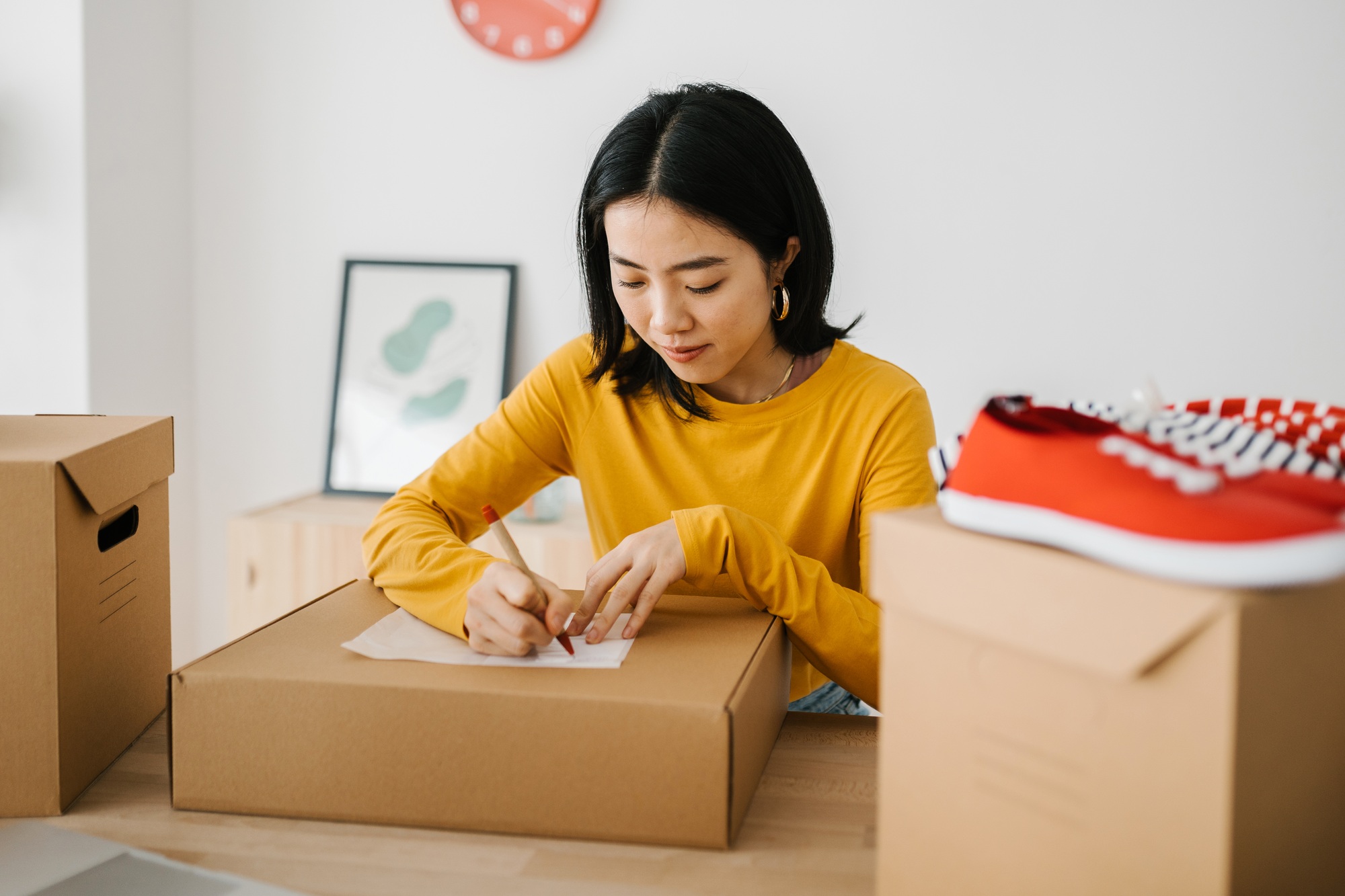 Small business freelancer woman preparing packages for delivering to customer