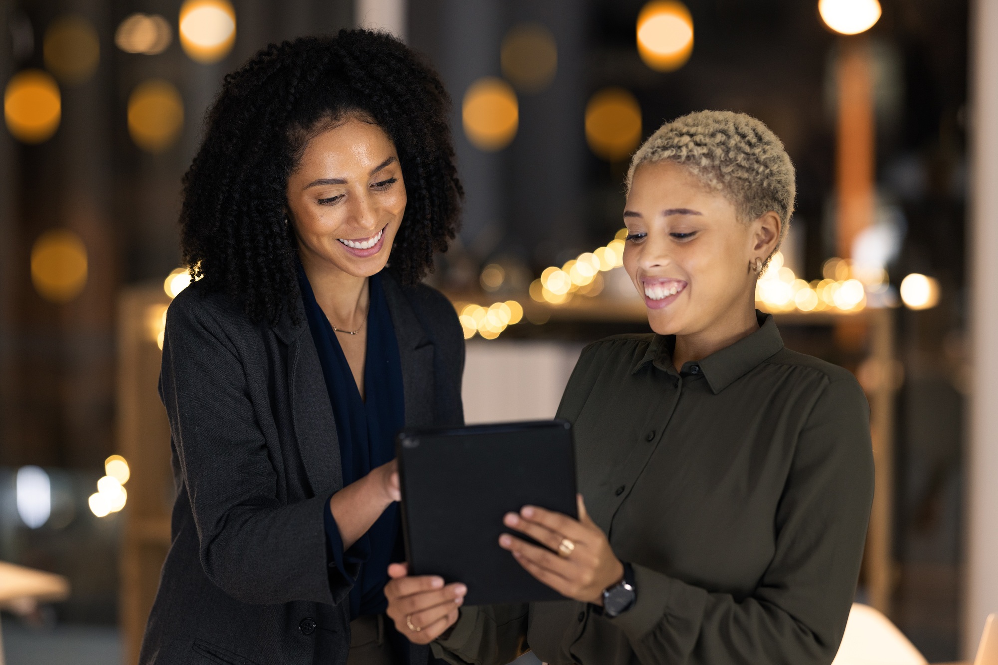 Tablet, black woman and social media manager at a digital marketing agency coworking on a branding