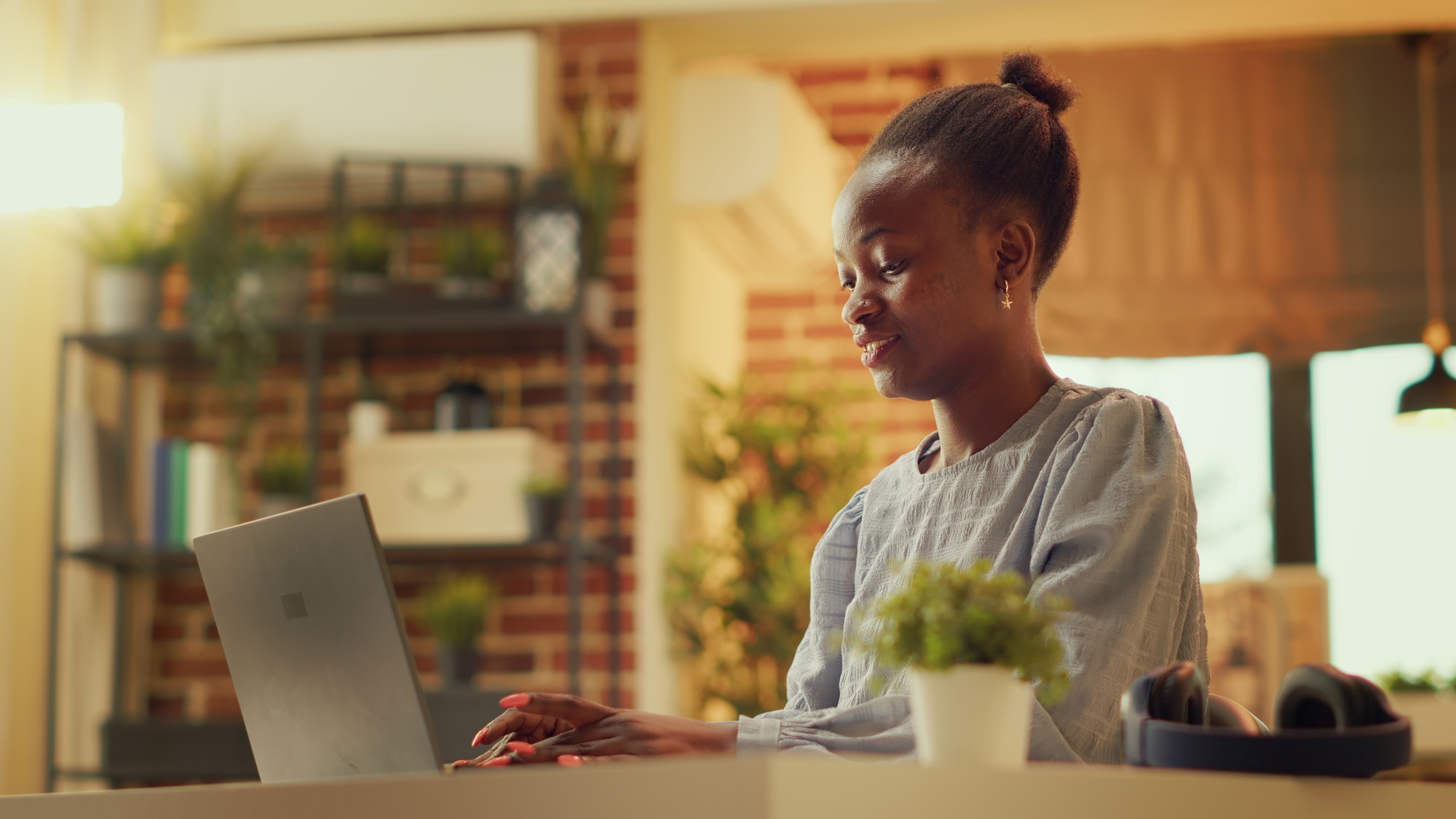 African american woman works at home