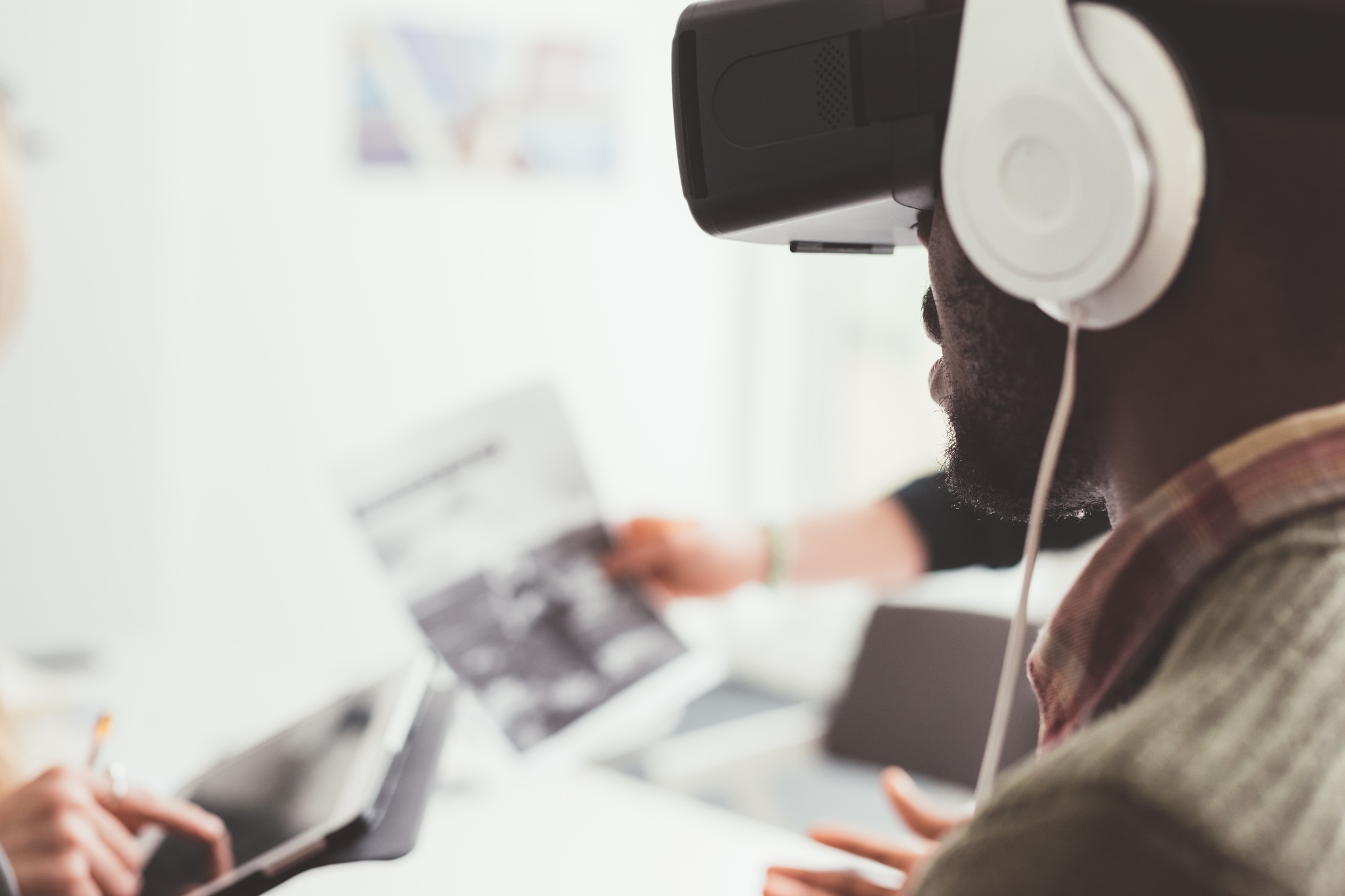 Black man indoor using 3d viewer