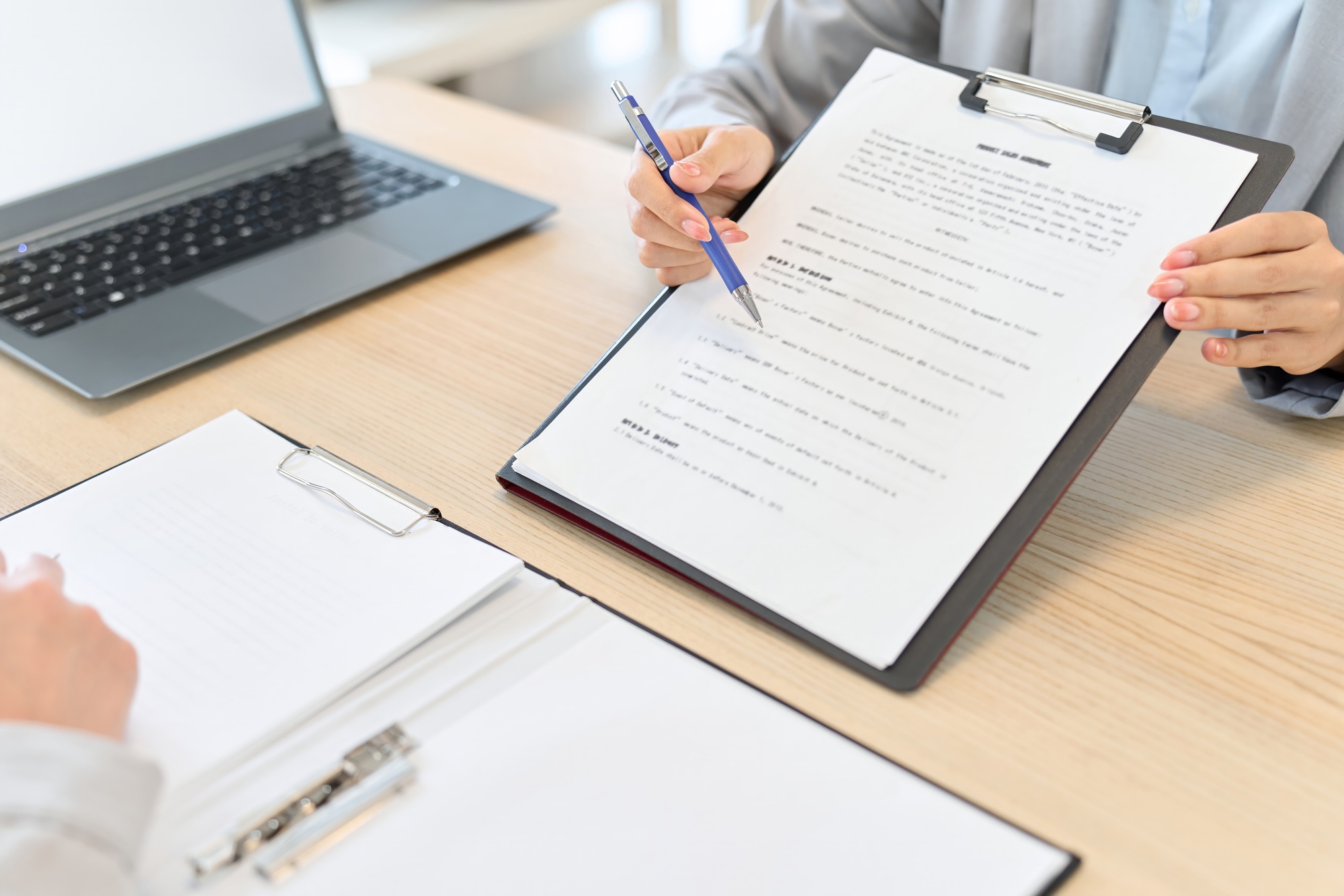 Business woman giving information on contract