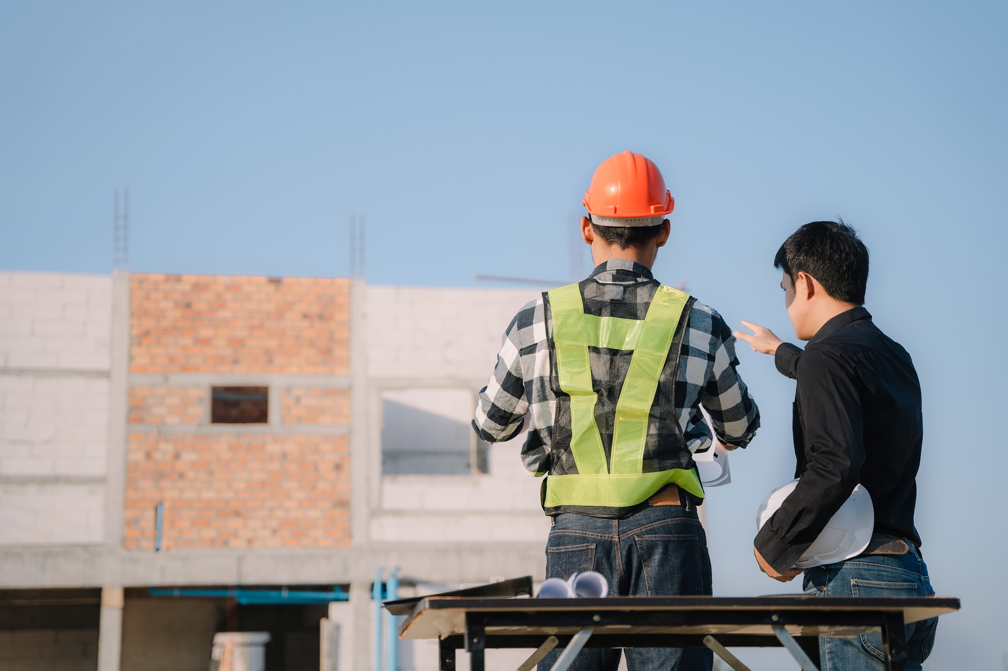 Businessman working as a team discussing data working.