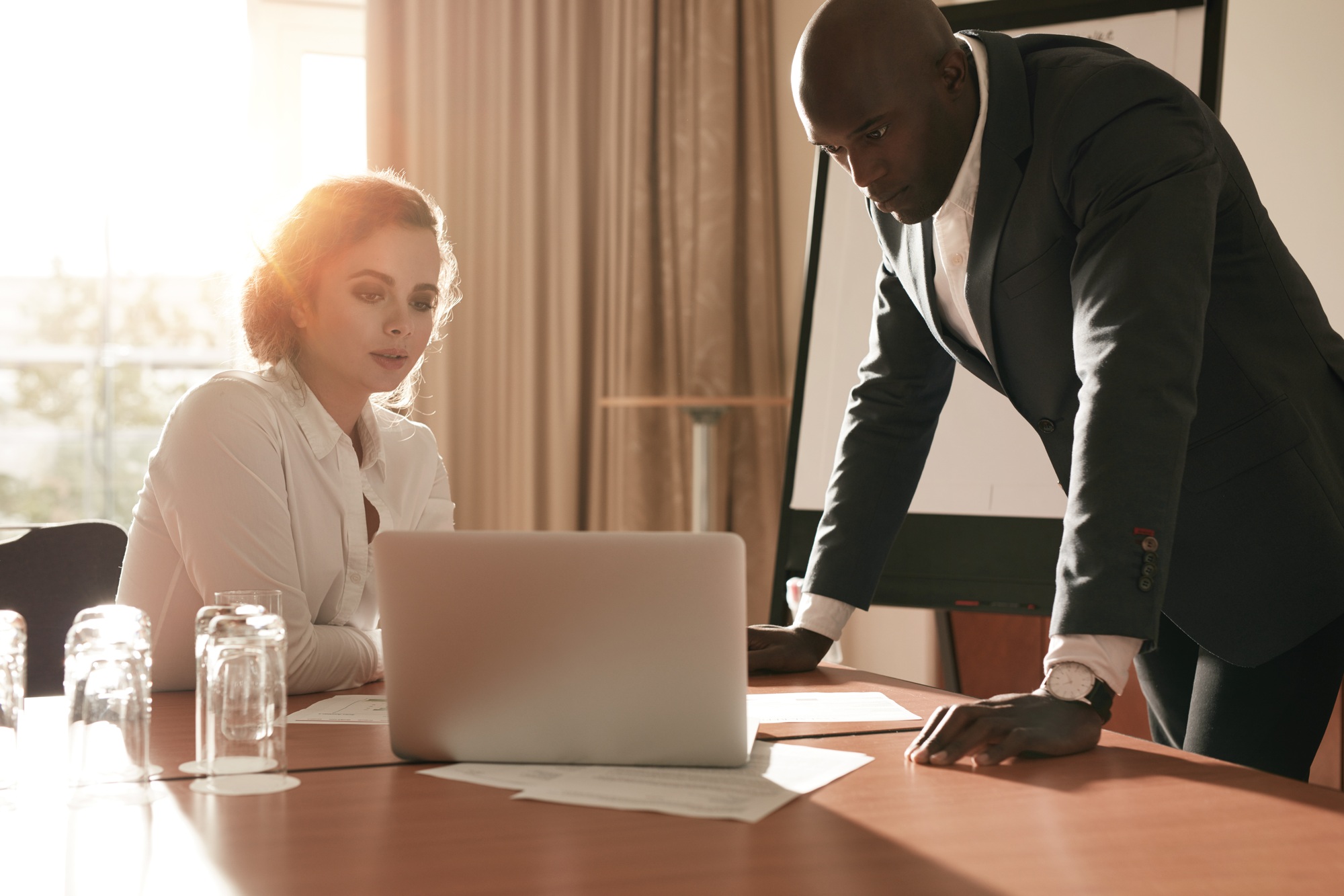 Businesspeople reviewing business plans.