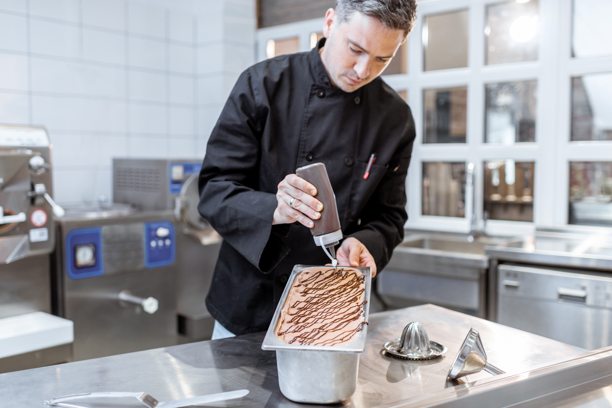 Chef making ice cream on the kitchen