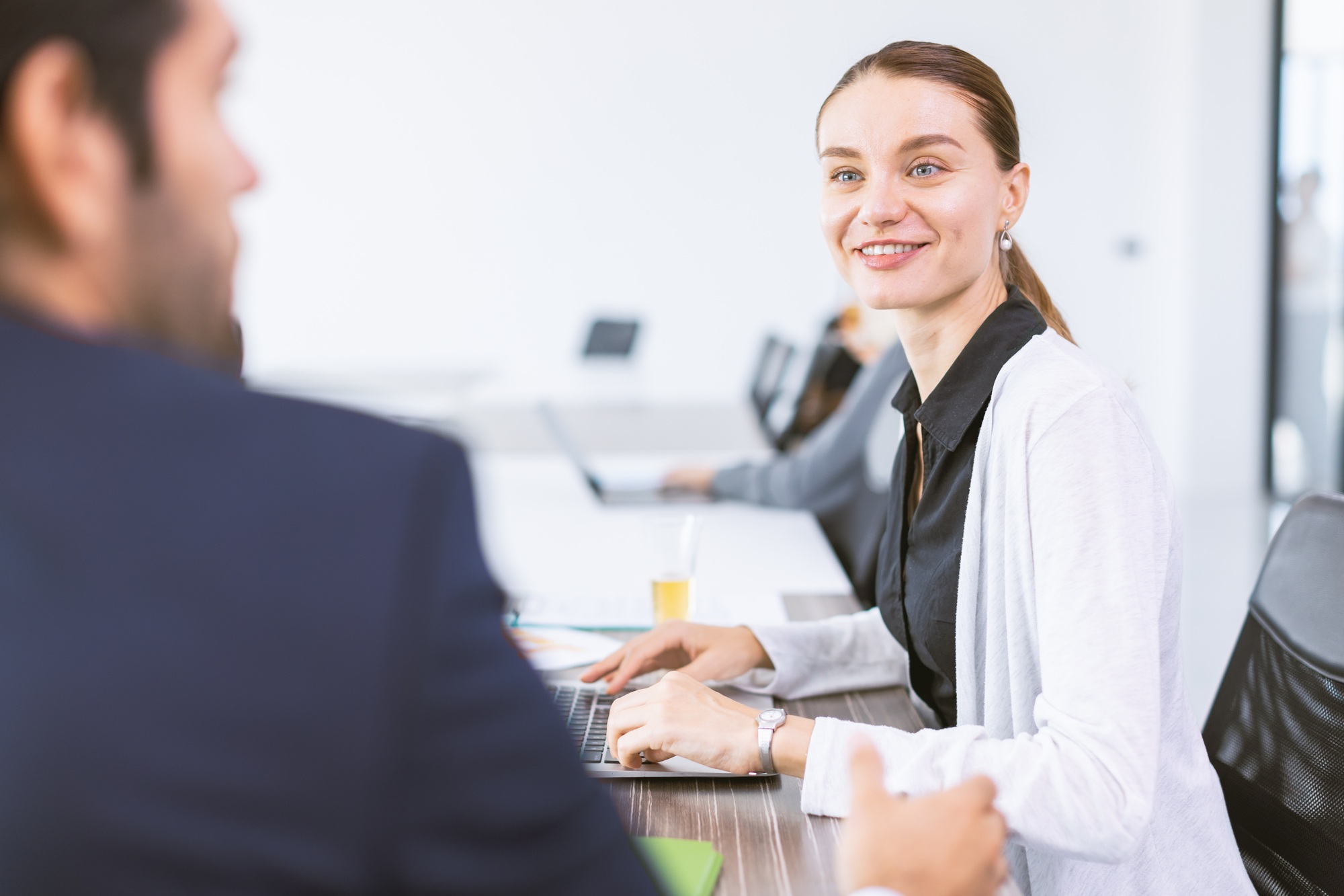 Confident businesswoman talking with manager. Adult woman job Interview. Sales represent products