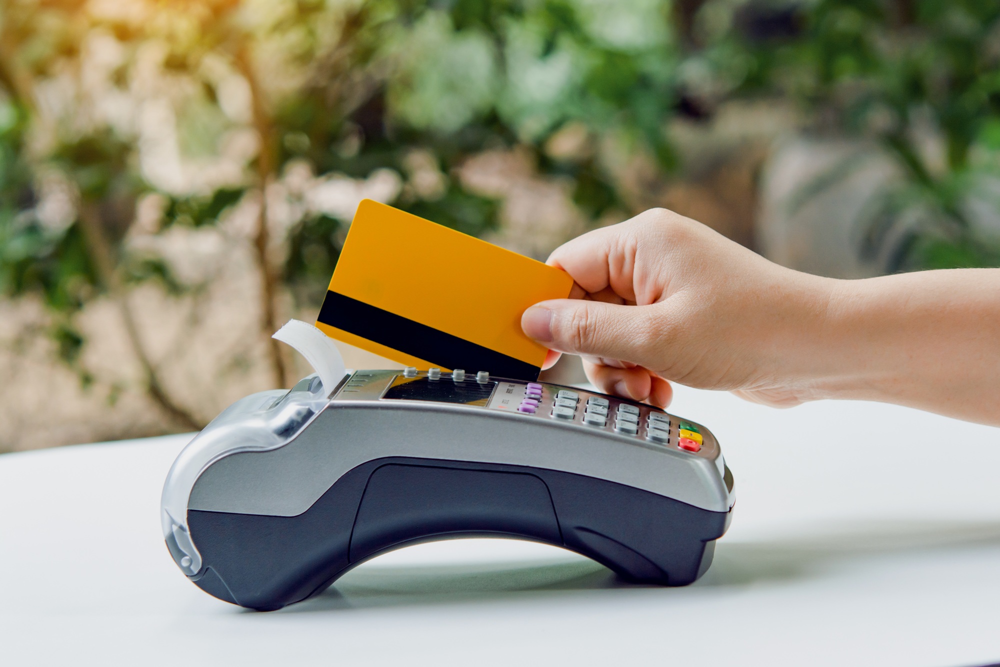 Credit card payment with EDC machine or credit card terminal.