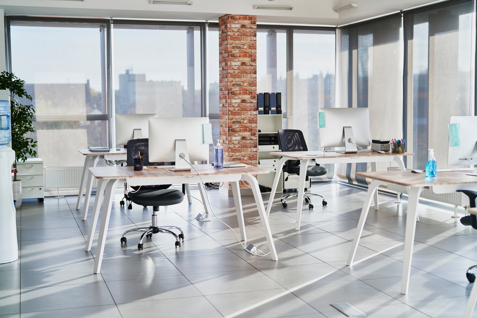 Empty open plan office with multiple work stations