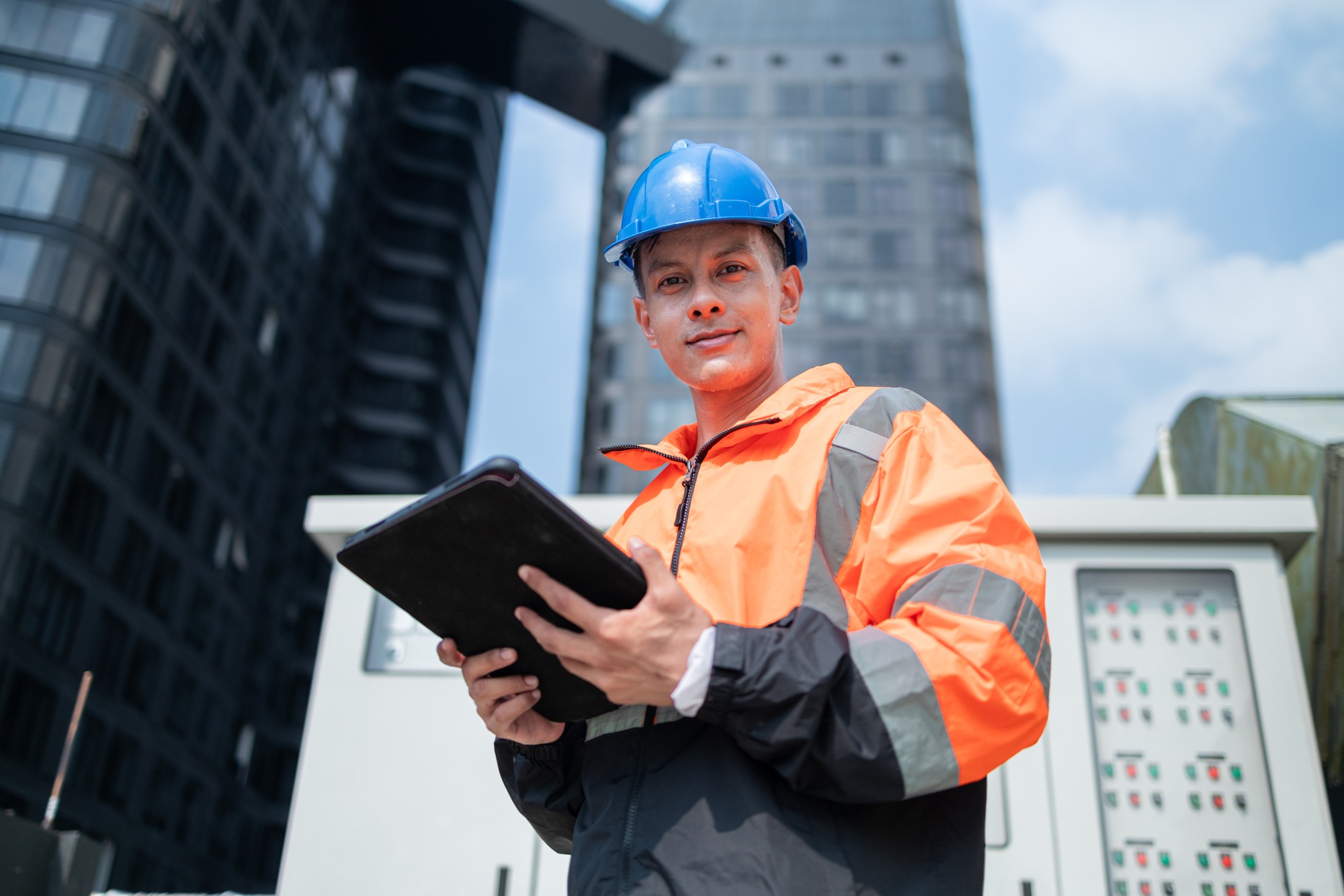 Engineer Using Tablet for Operational Management