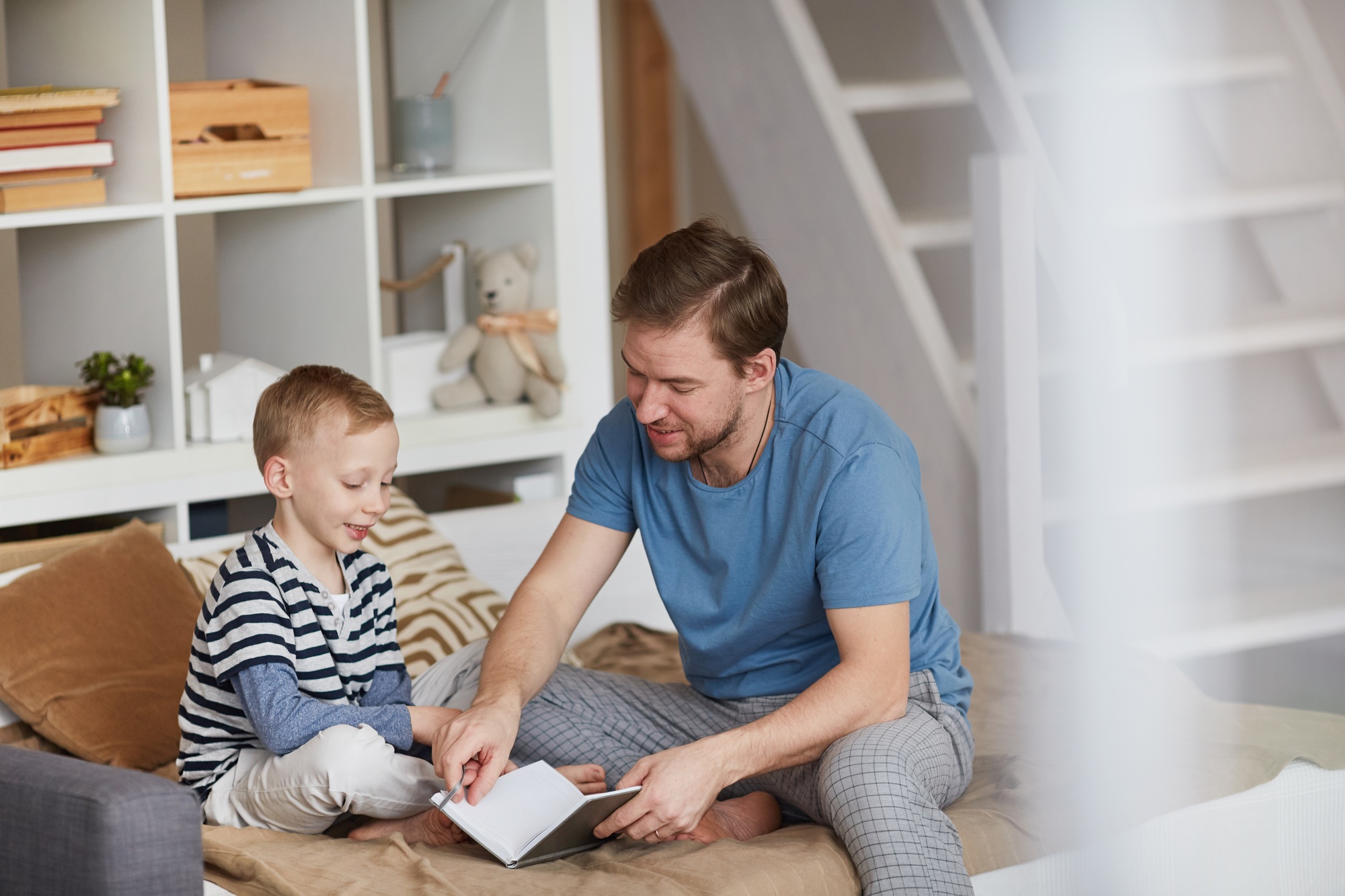 Father reading favorite book to son