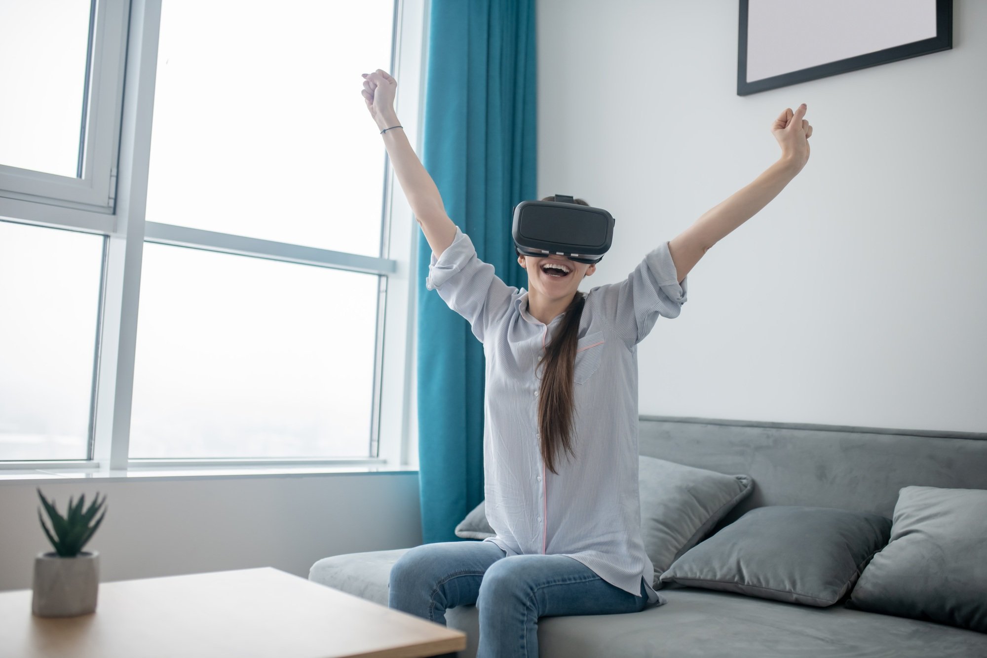 Female gamer enjoying a 3D simulation game