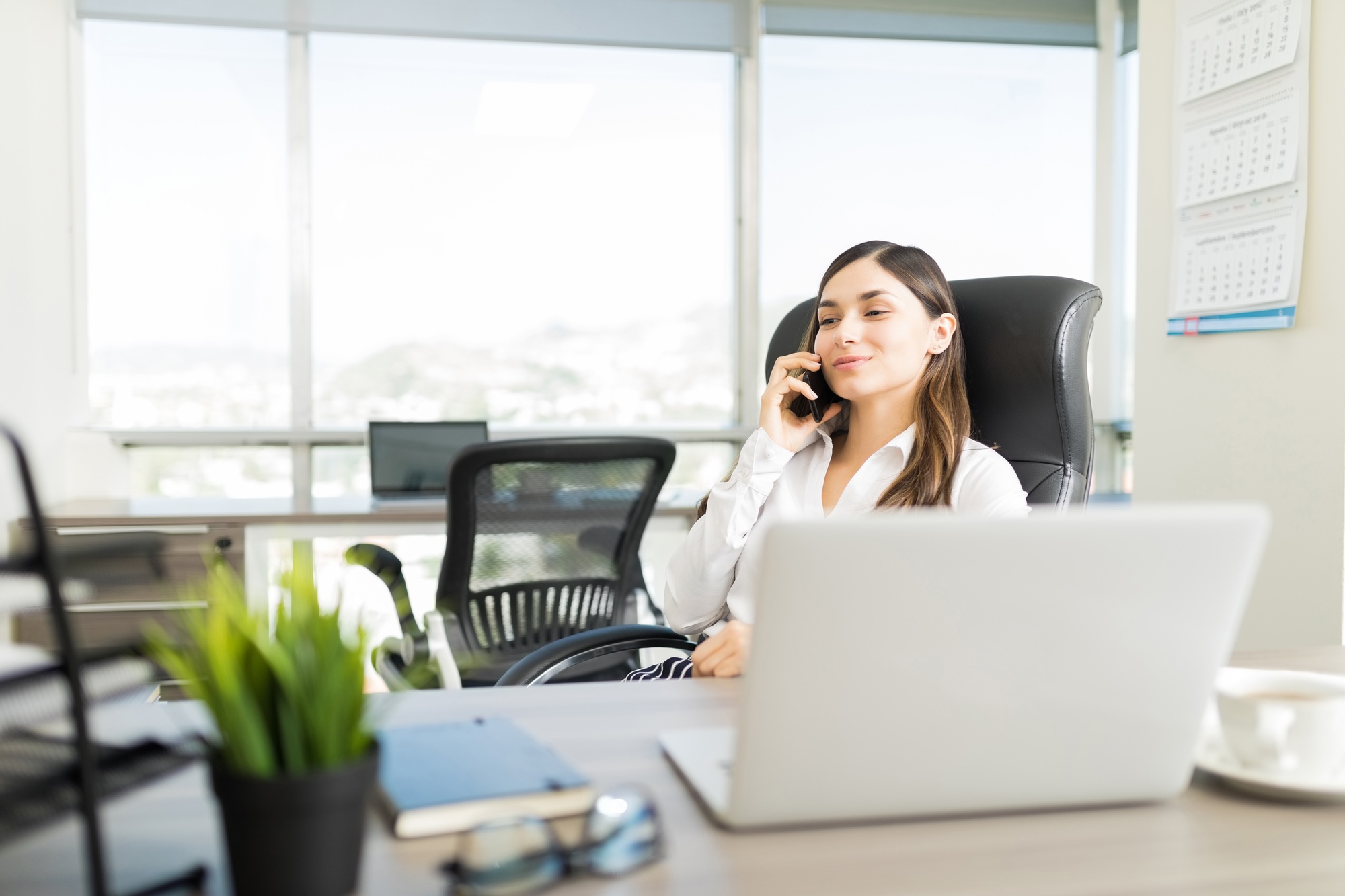 Female Real Estate Agent Increasing Business With Cold Calling
