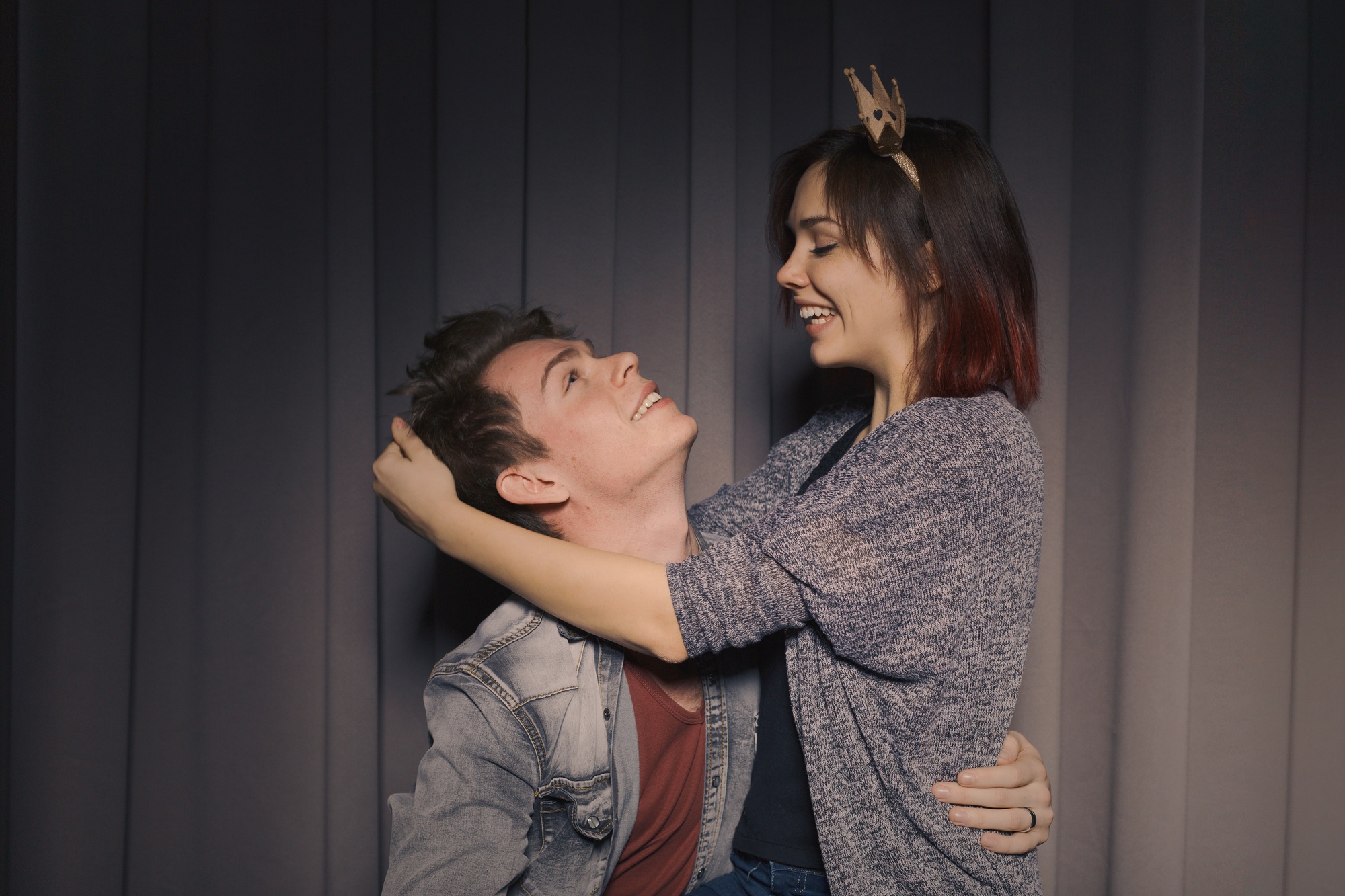 Happy couple in a photo booth