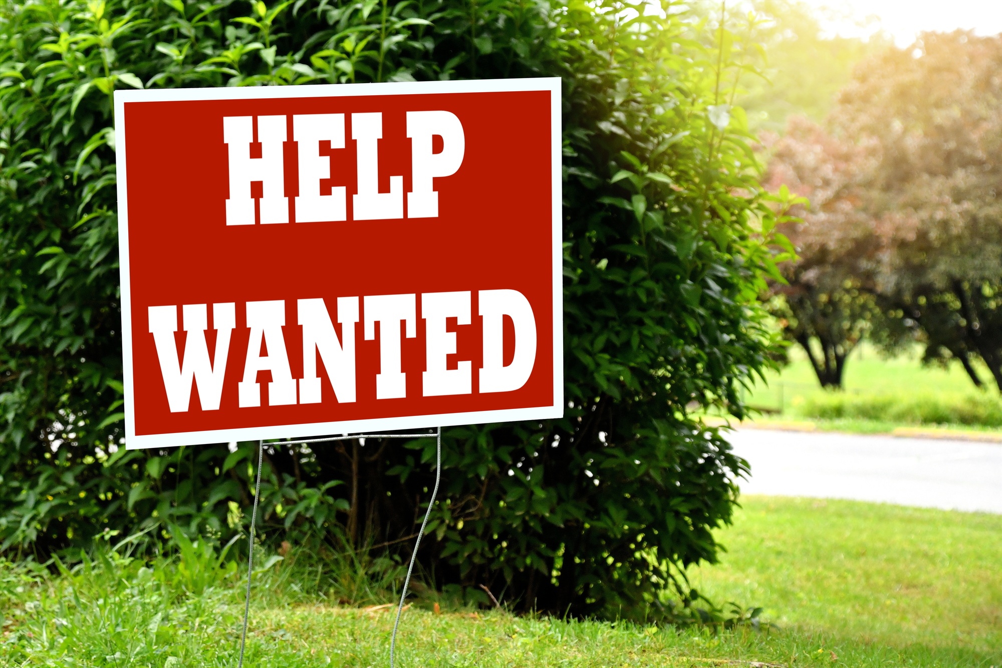 Help Wanted Sign - employers advertising job openings to hire employees for their company business