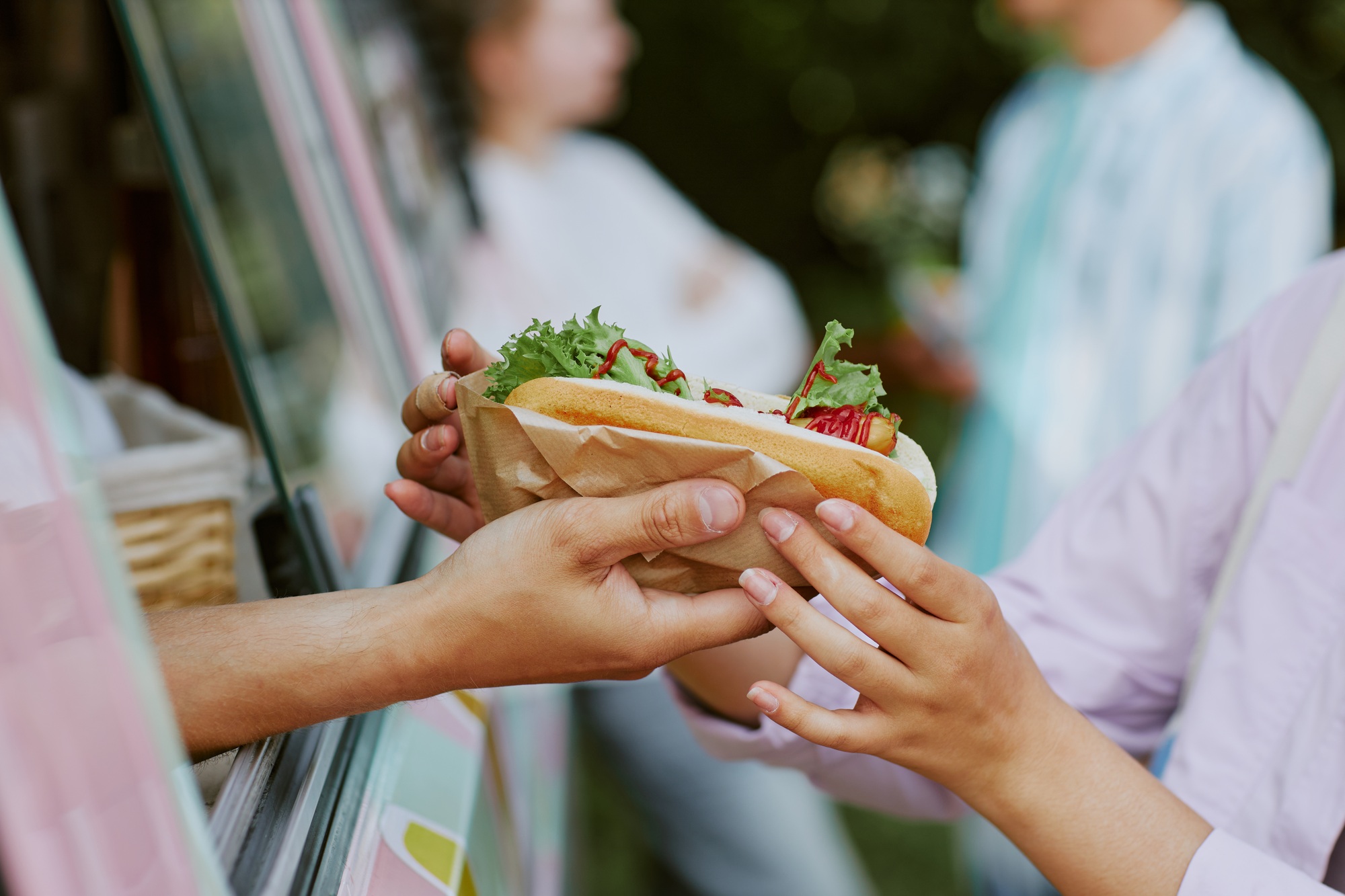 Hot Dog in Female Hands