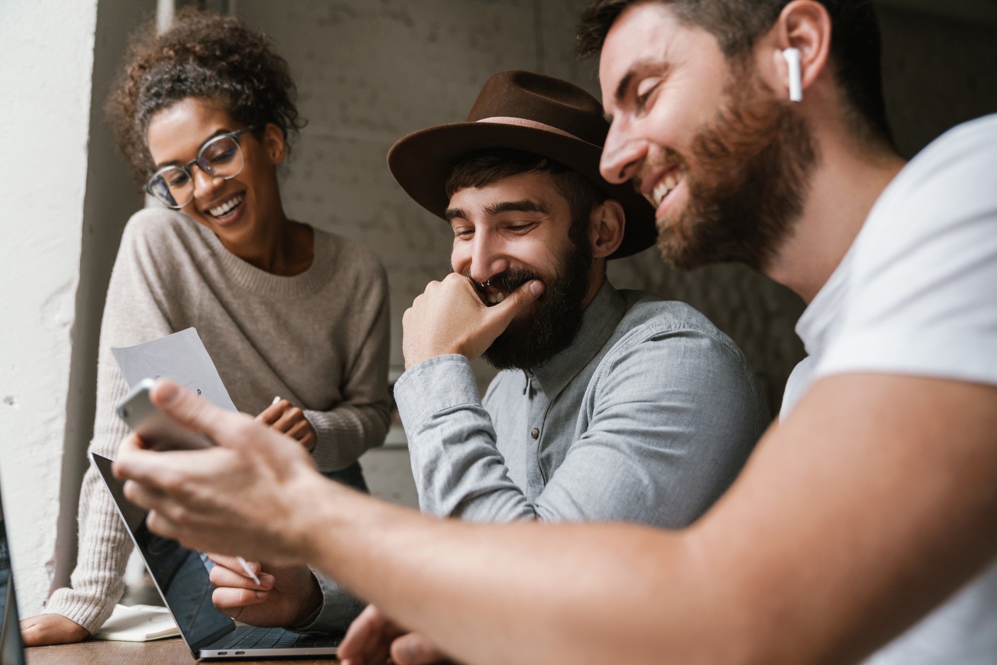 Image of multiethnic young business people working together at office