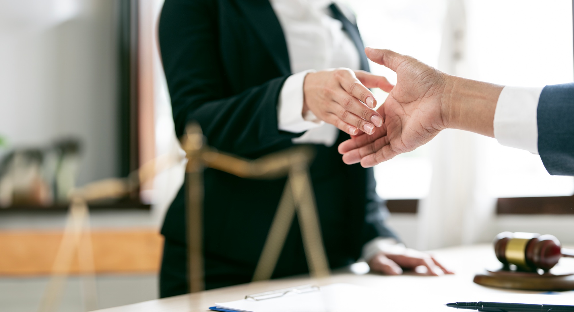 Lawyers shake hands with business people, lawyer discussing contract agreements