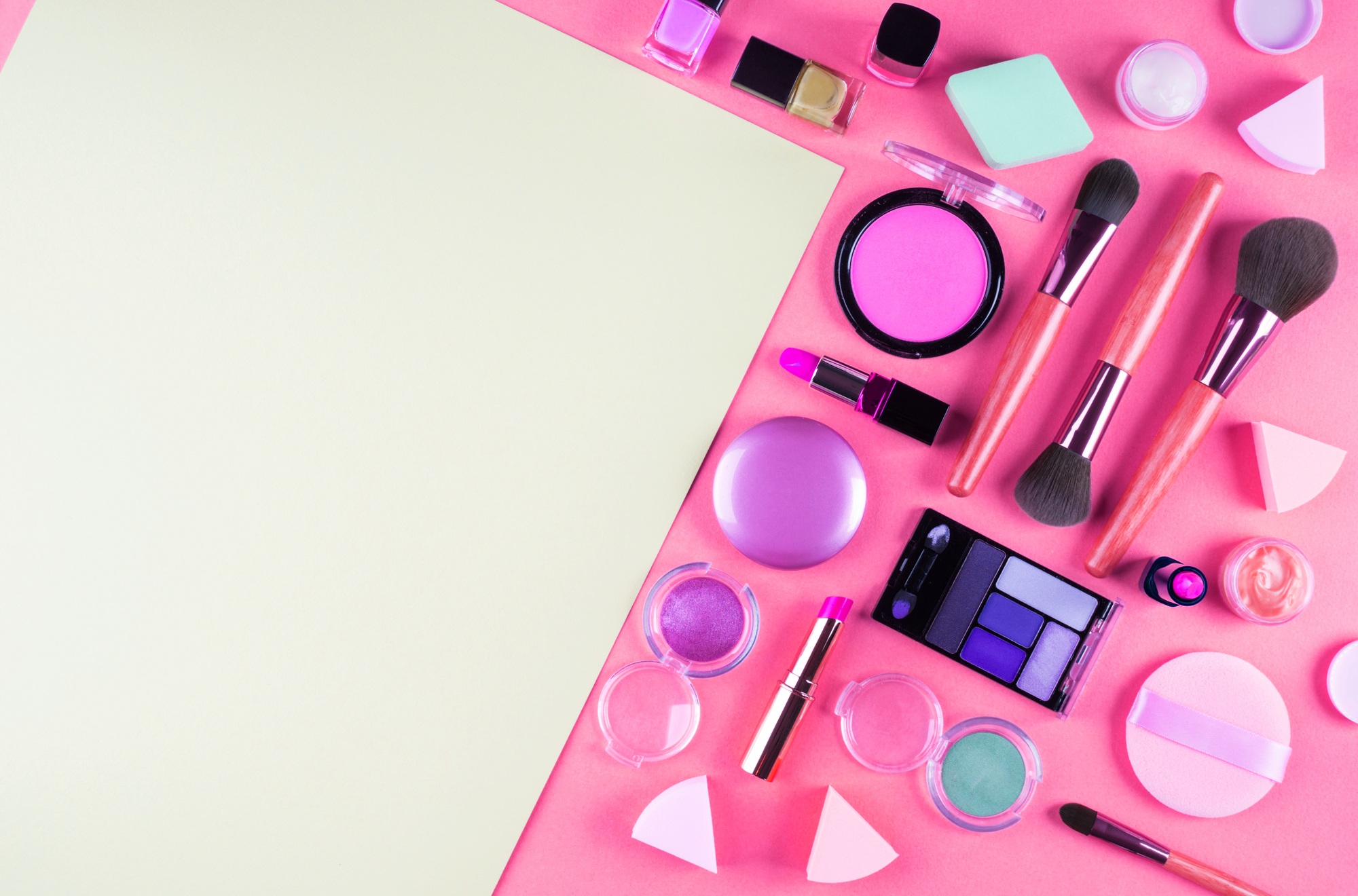 Make up accessories on pink. Flat lay