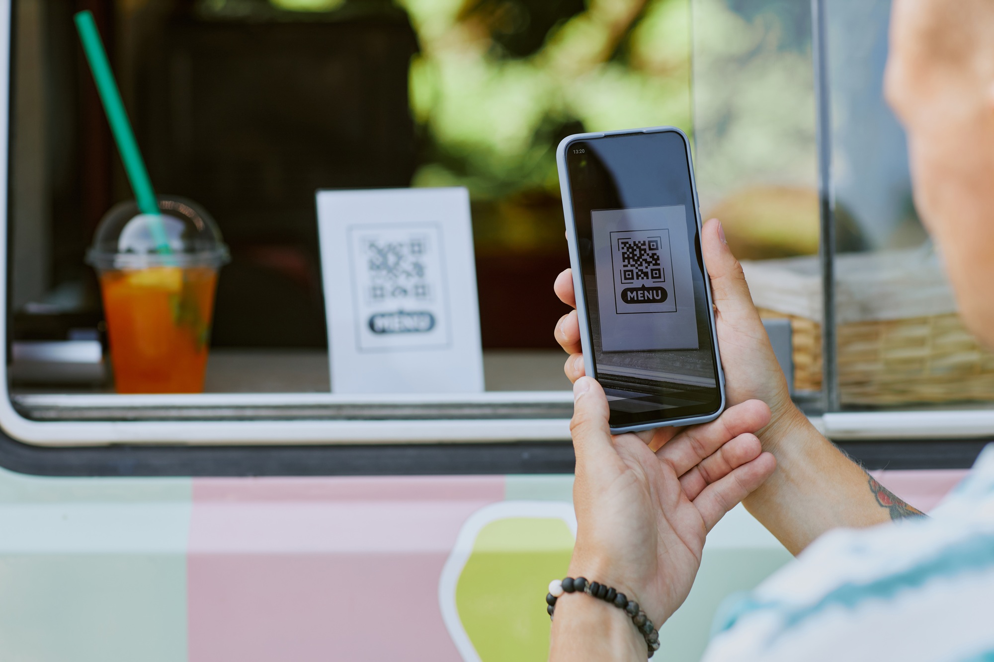 Man Scanning QR Code