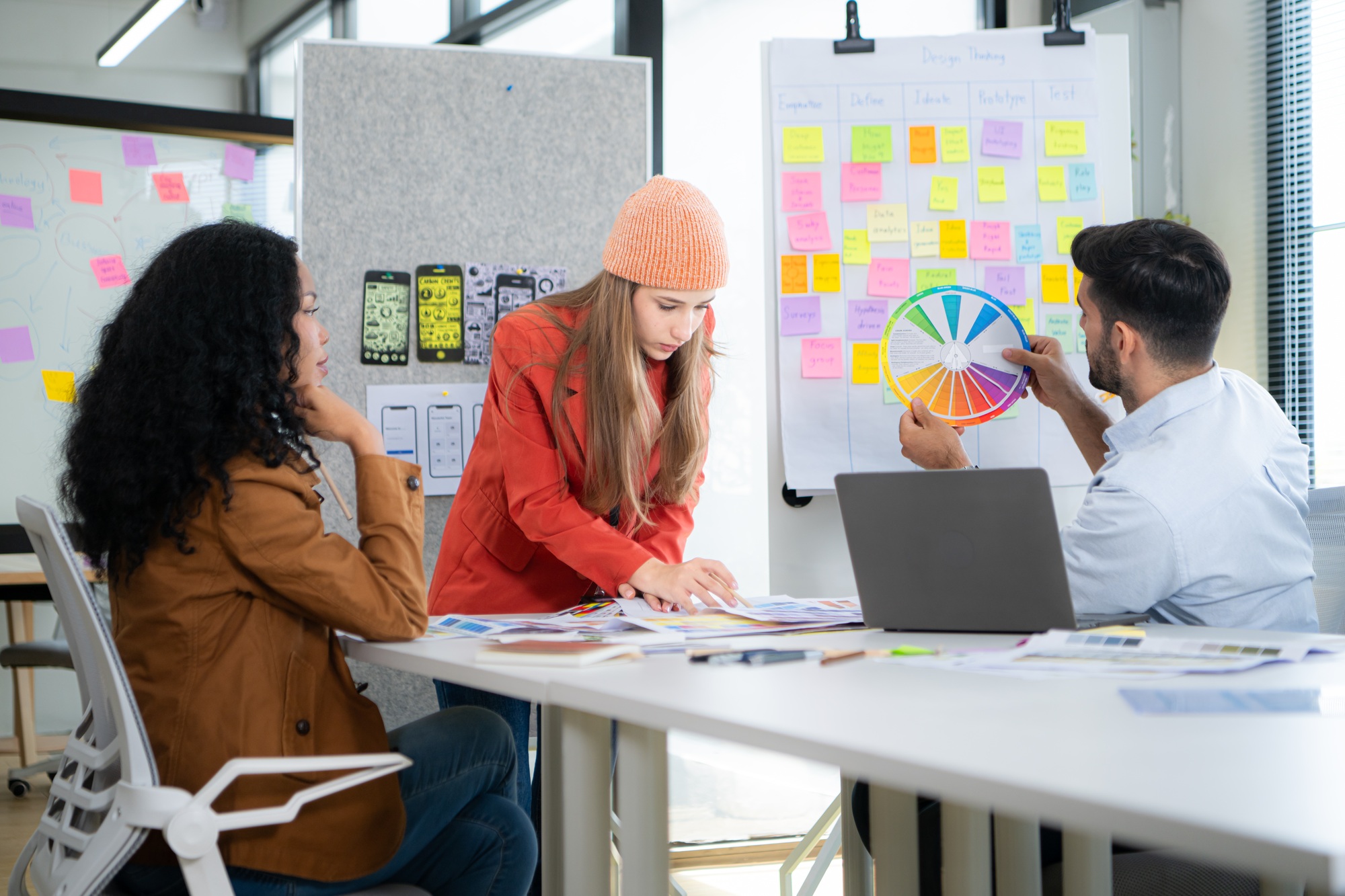 Multiethnic young business people working together in modern office, Collaborate to designing an app