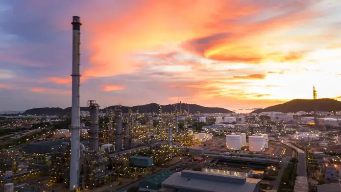 Oil Refinery plant at sunset. Gas Chemical Equipment Prodiction import export