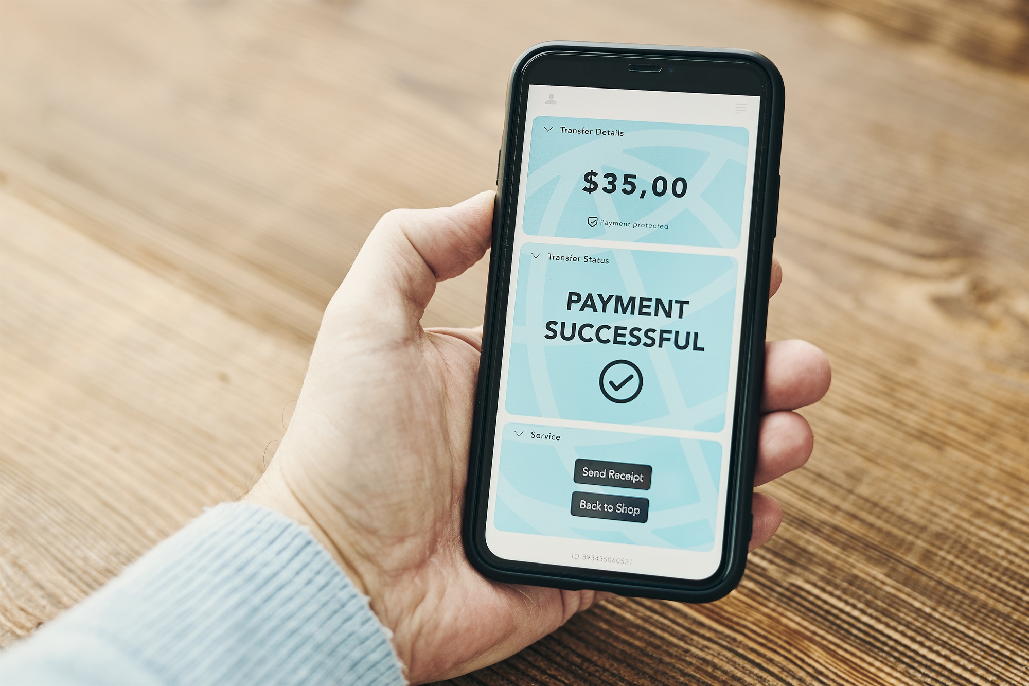 Paying with smartphone for online shopping. Paying using mobile payment app. Payment successful