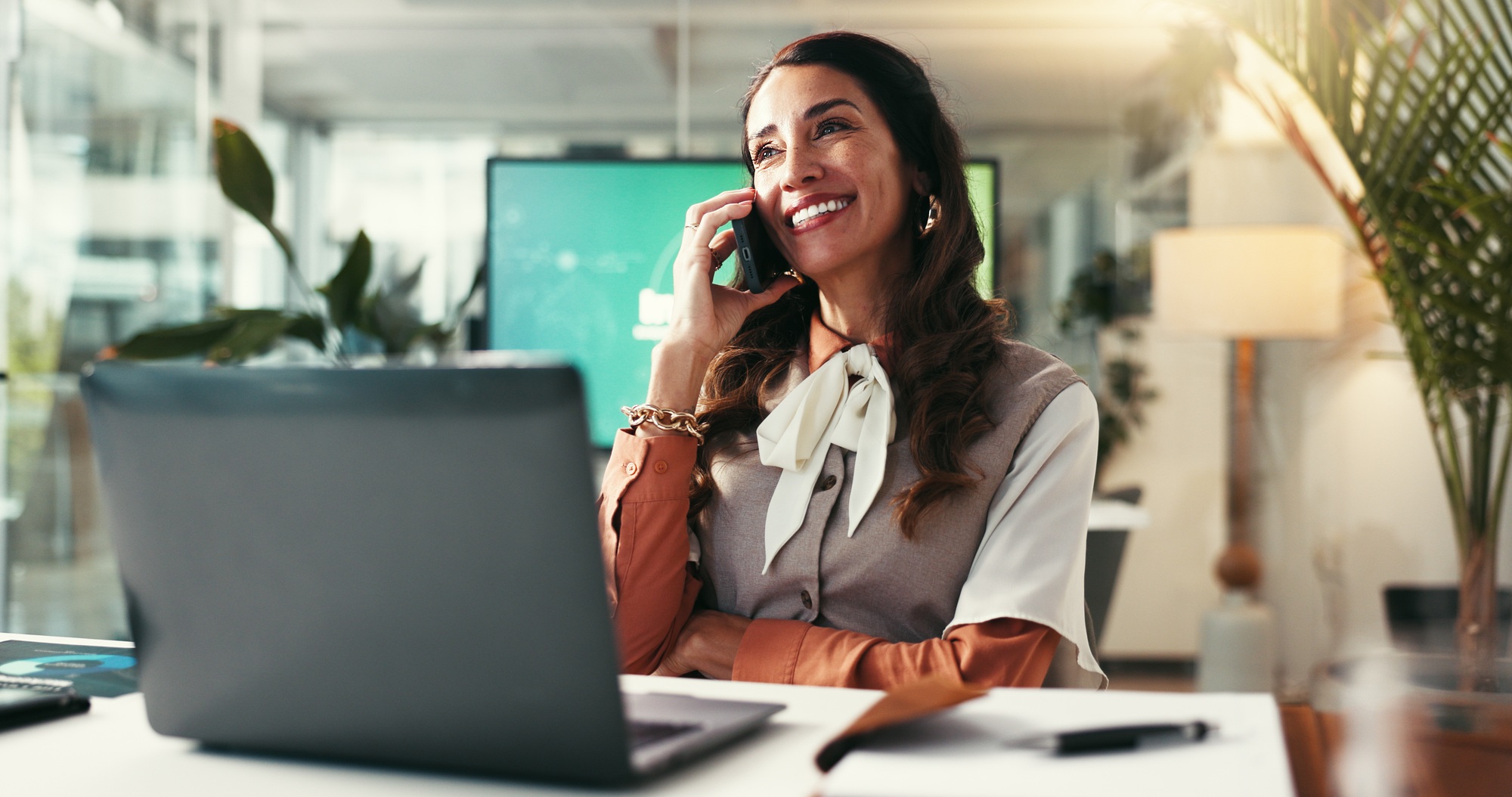 Phone call, creative and woman in office, talking and communication for publishing of ebook or smil