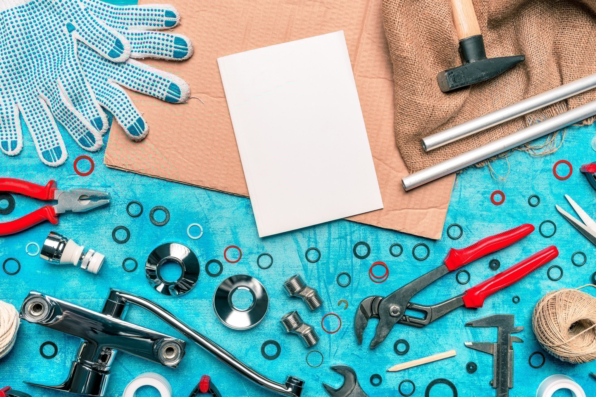 Plumbing tools and blank notebook mock up