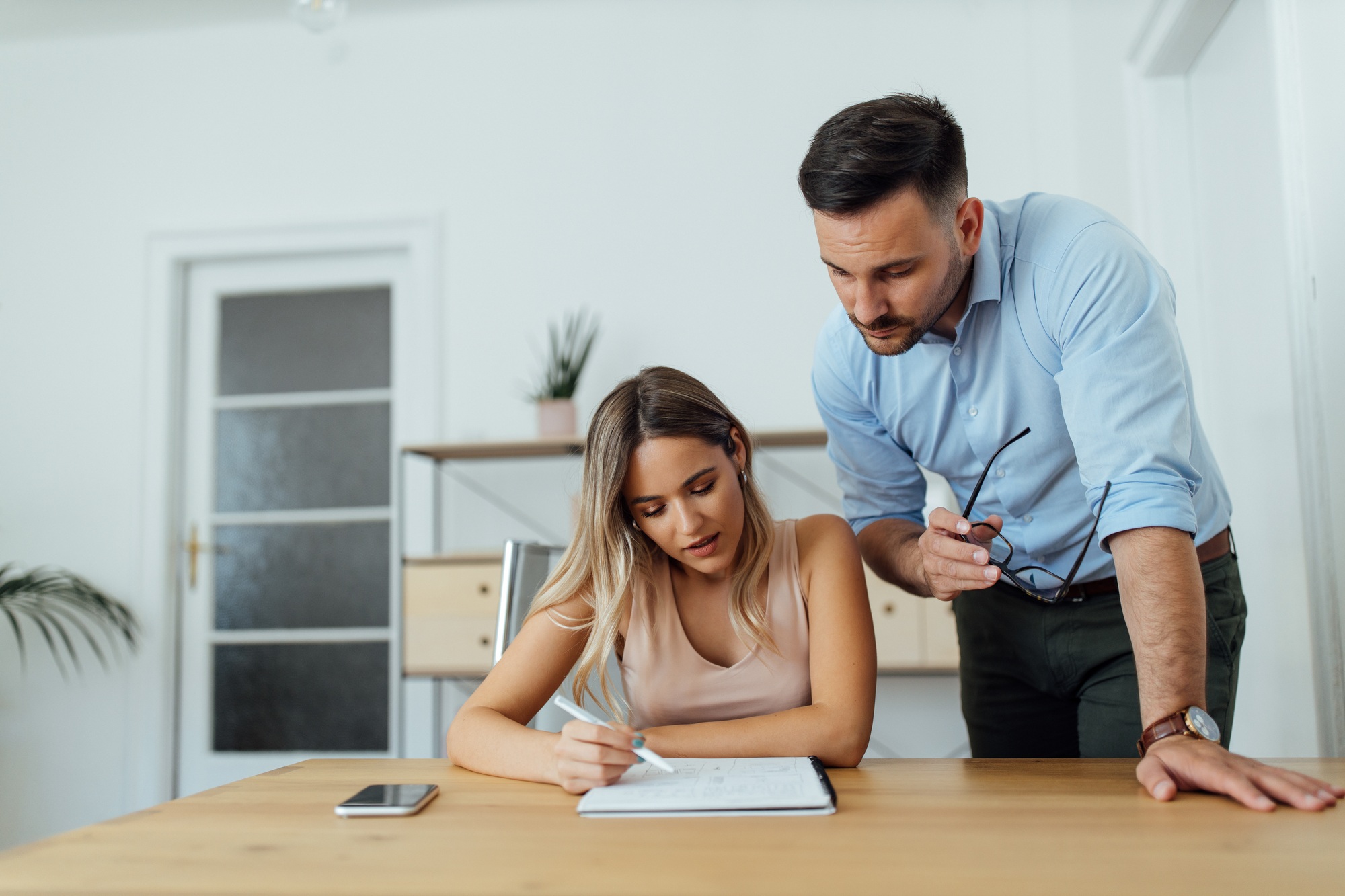 Portrait of a college student and her tutor.