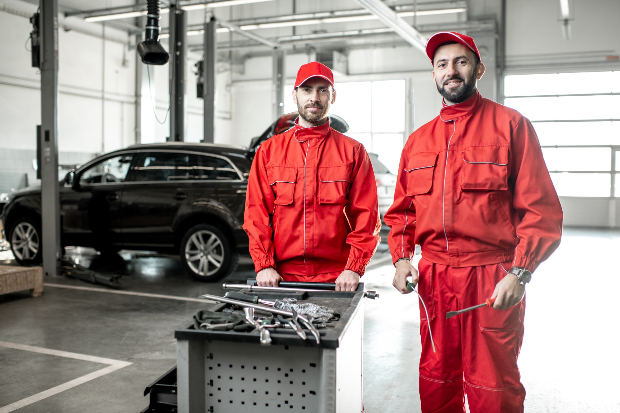 Portrait of an auto mechanics indoors