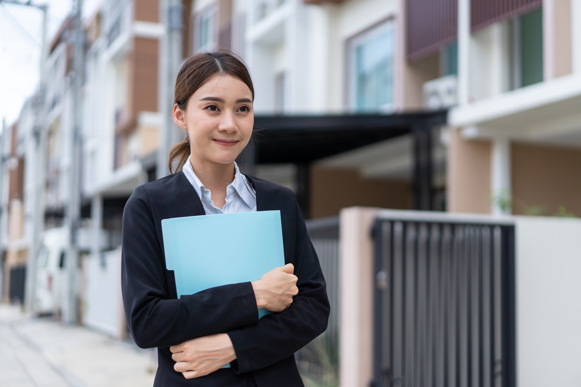 Portrait of Asian business woman looking at camera. Job application and recruitment concept