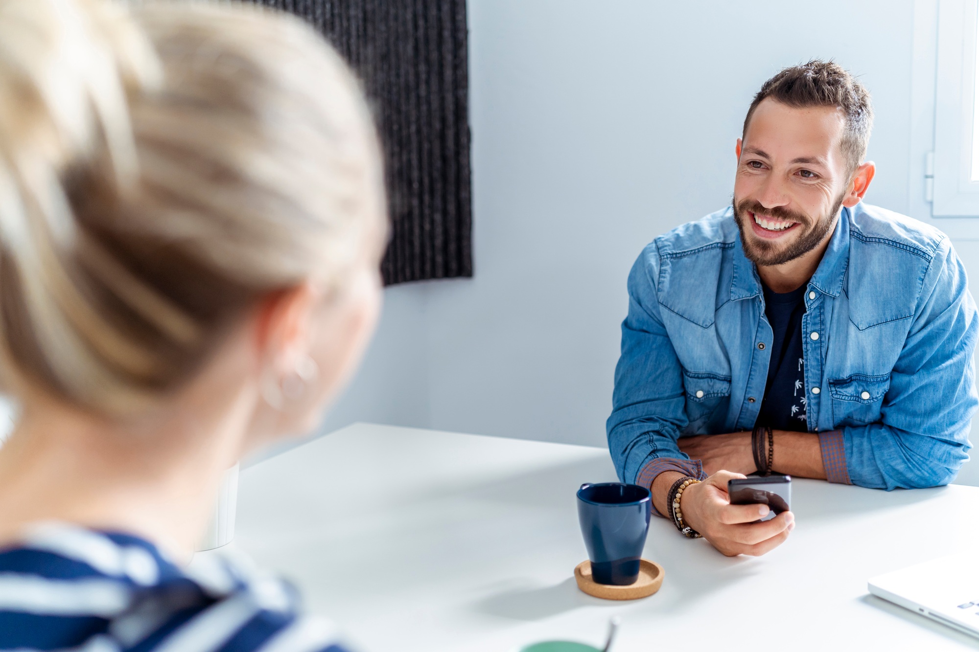 Startup businesspeople having informal meeting in office