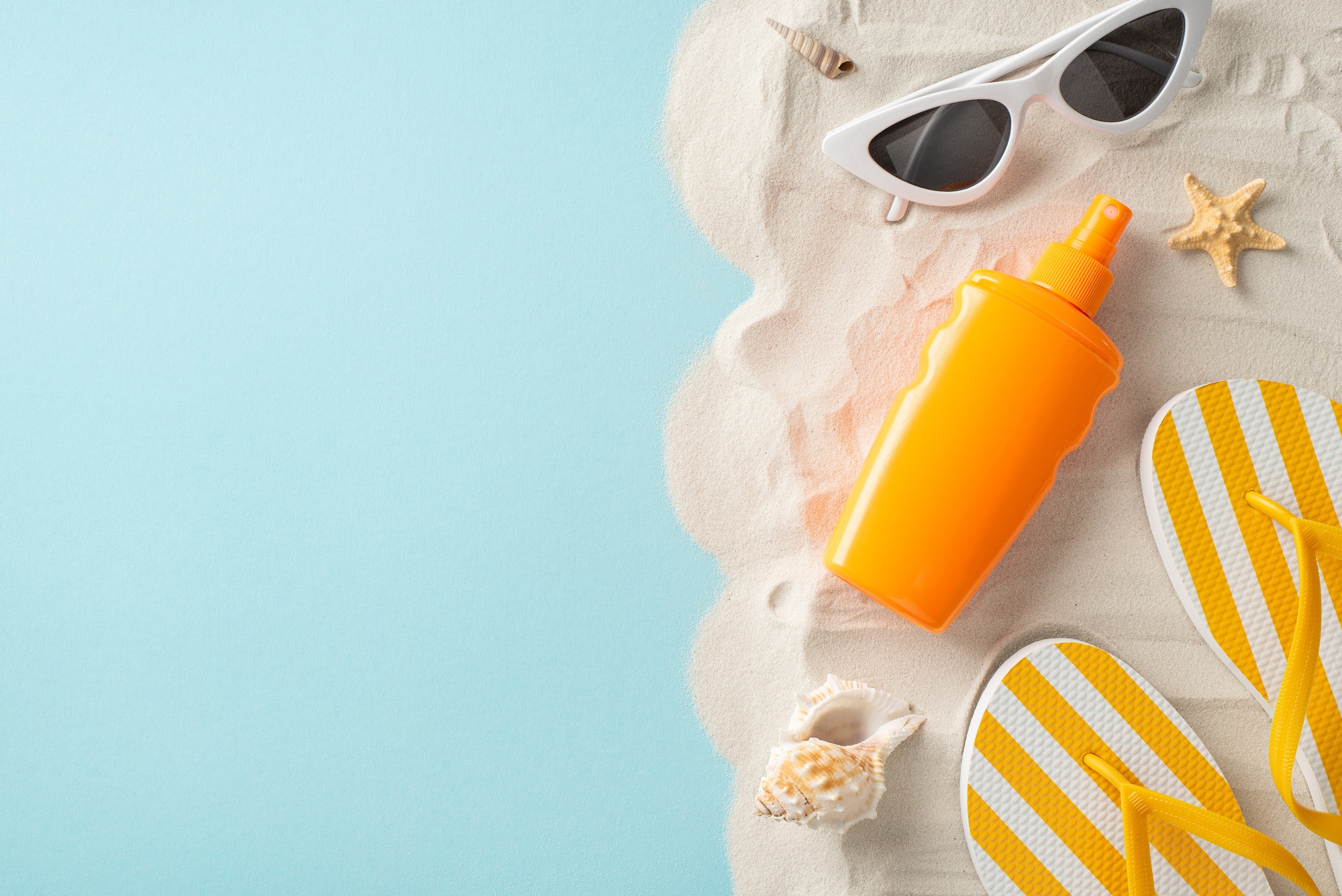 Sunscreen marketing concept. Top view of unbranded sunblock lotion, paired with glasses