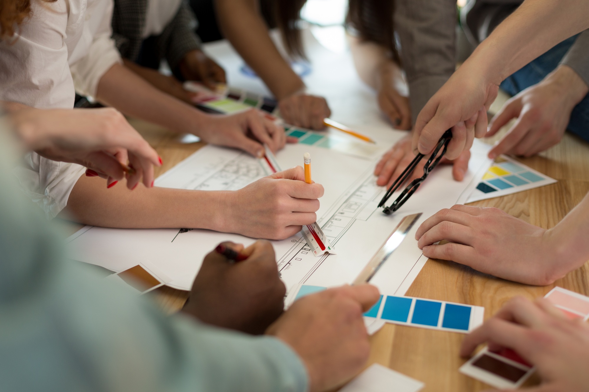 Team of architects working on construction plans