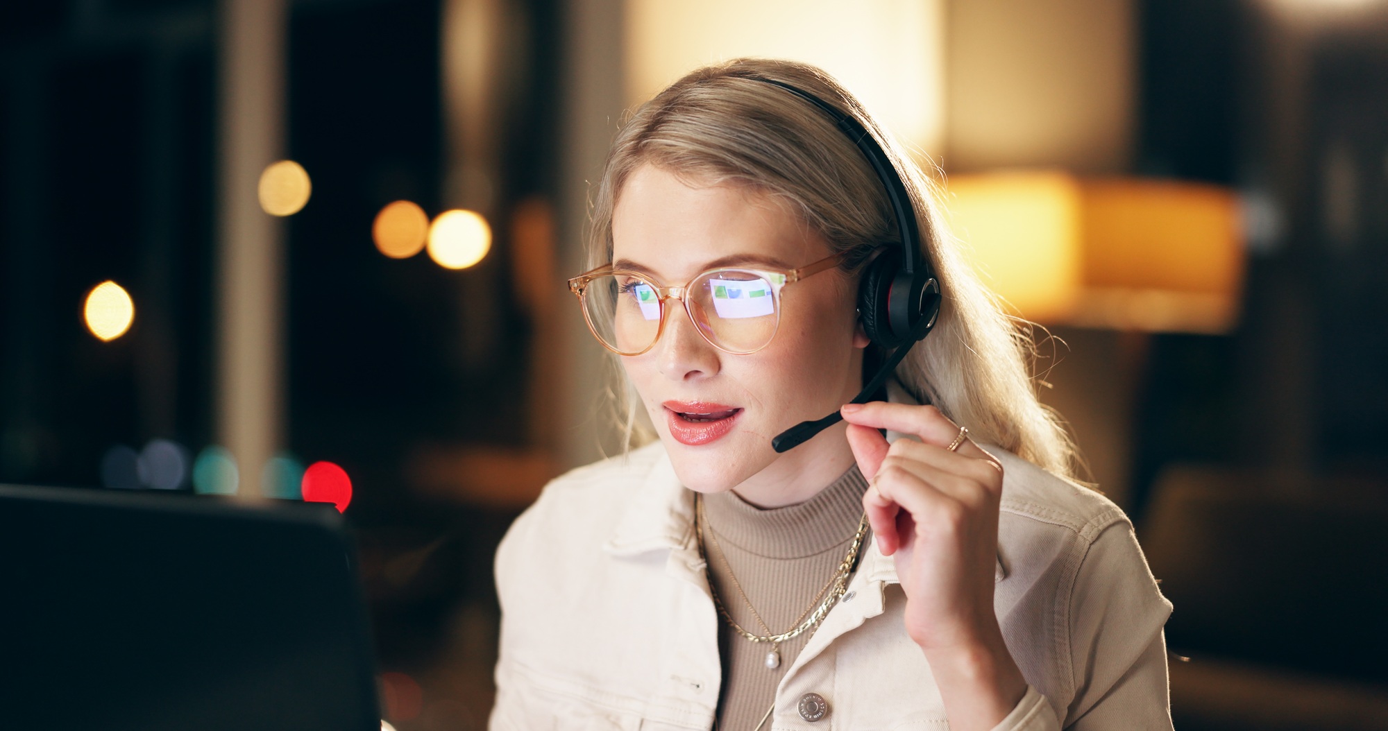 Technical support, headset and woman consultant in office at night for virtual assistant surveillan