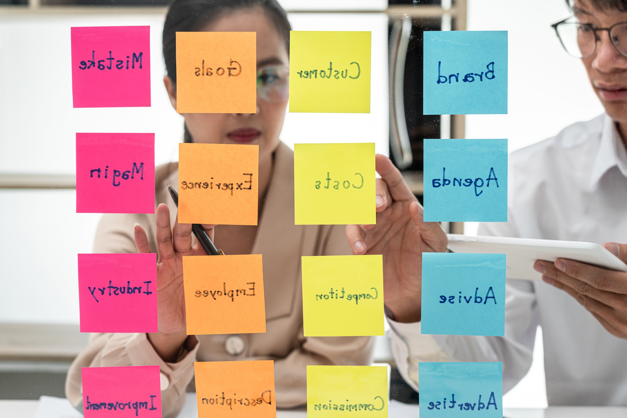 Two business people brainstorming with new startup project to planning marketing plan together