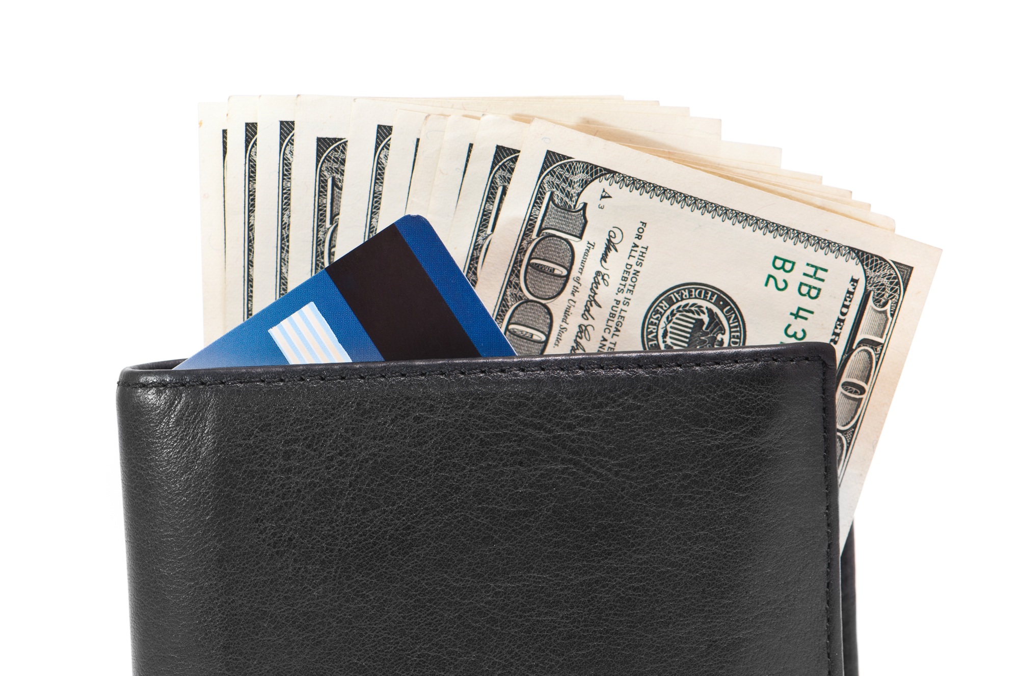 wallet with dollars and credit cards