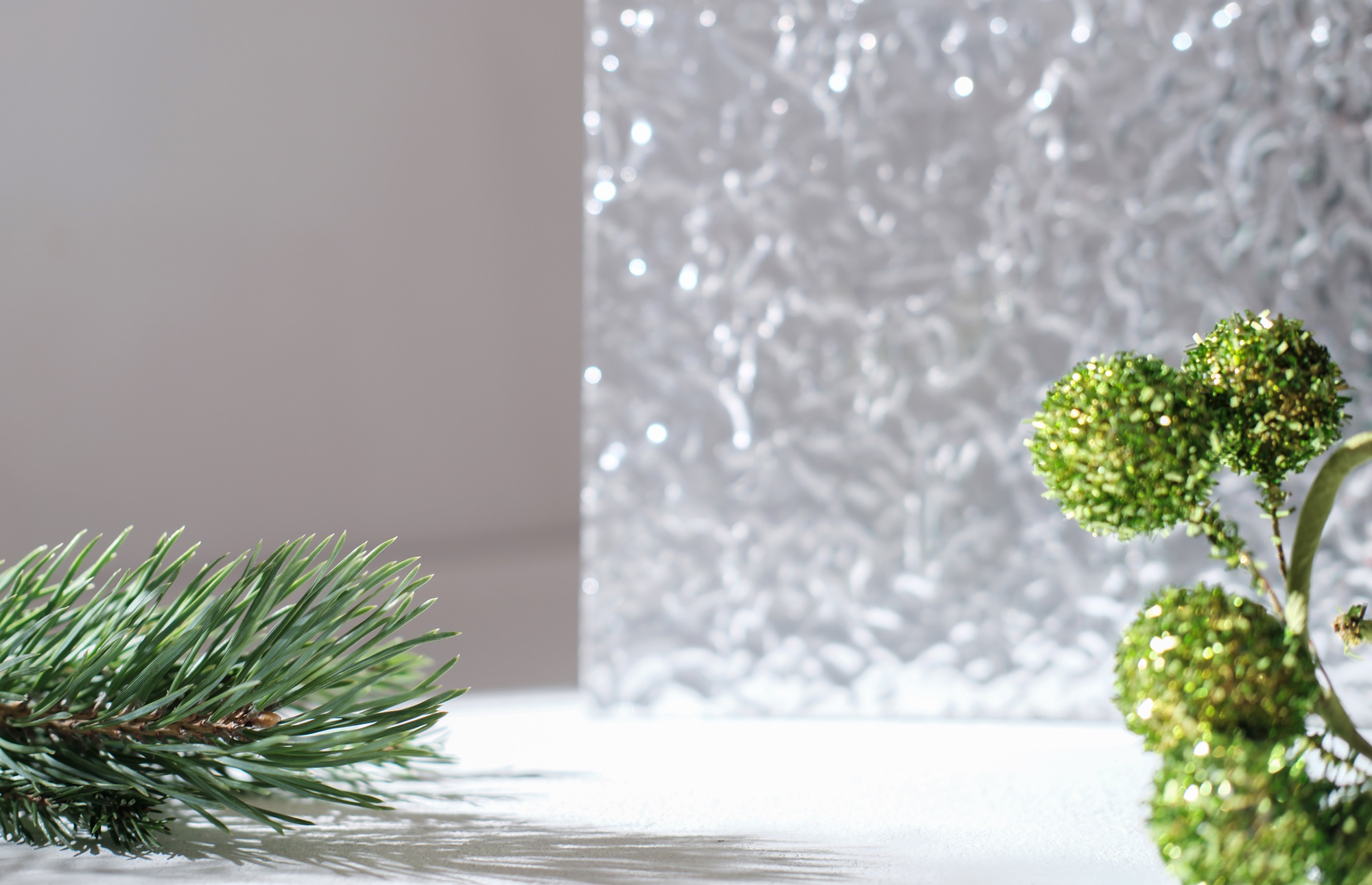 Winter Christmas scene with pine twigs for product presentation cosmetics. advertising display